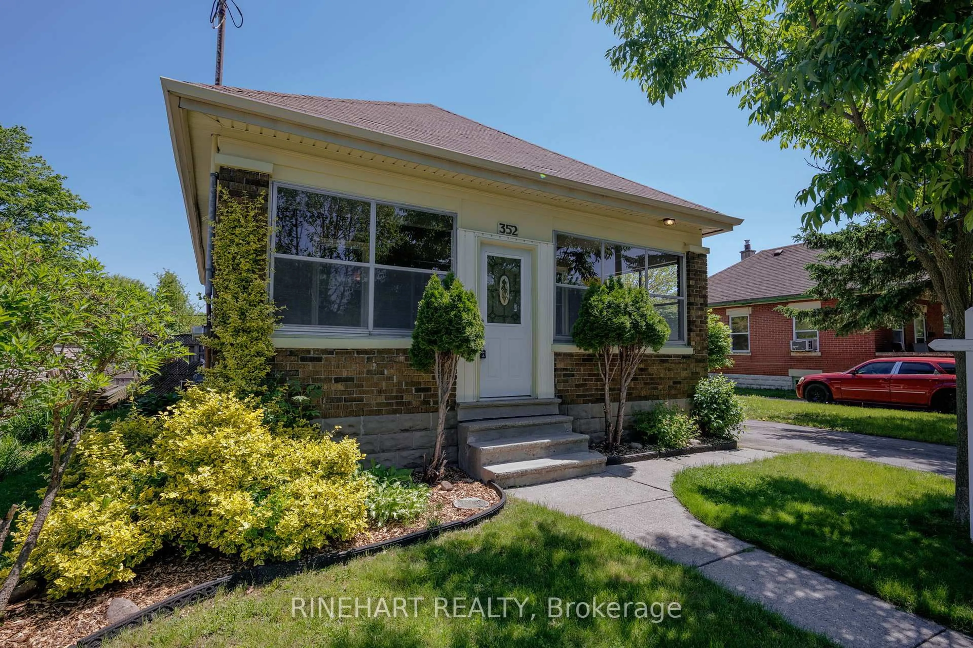 Home with brick exterior material, street for 352 Edmonton St, London East Ontario N5W 4Y5