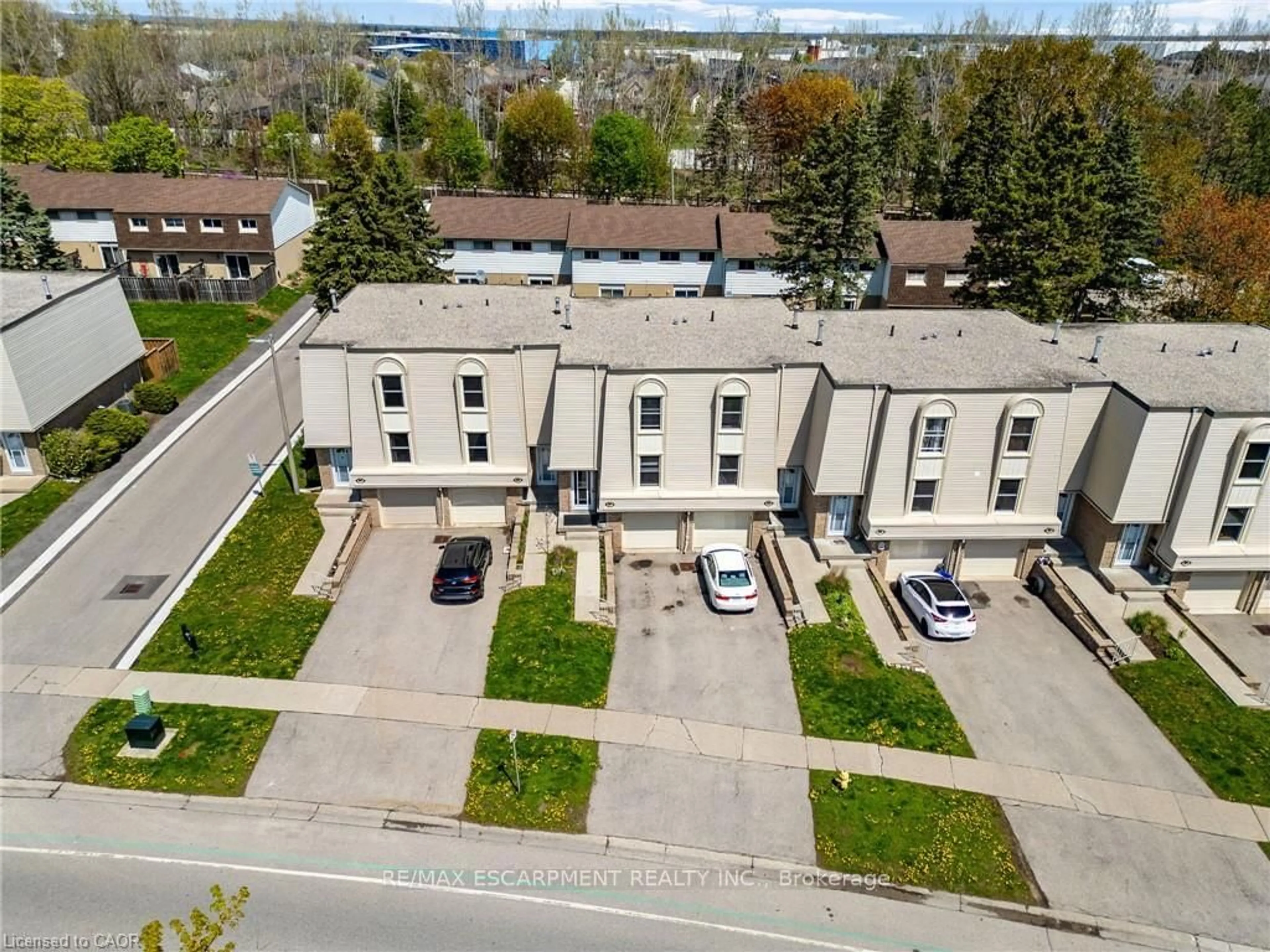 A pic from outside/outdoor area/front of a property/back of a property/a pic from drone, street for 662 Grey St #C, Brantford Ontario N3S 4Y4