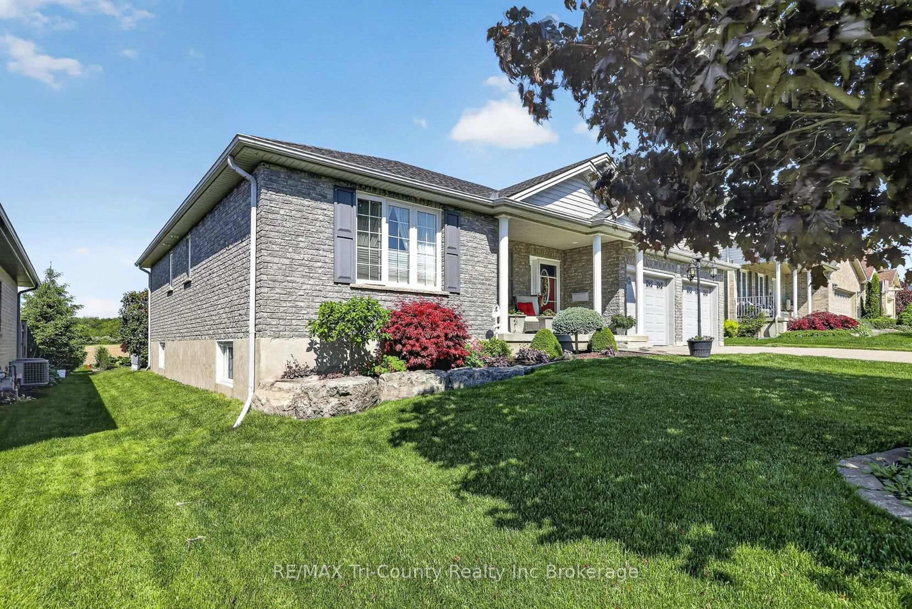 Home with brick exterior material, street for 31 Morning Glory Dr, Tillsonburg Ontario N4G 5S9