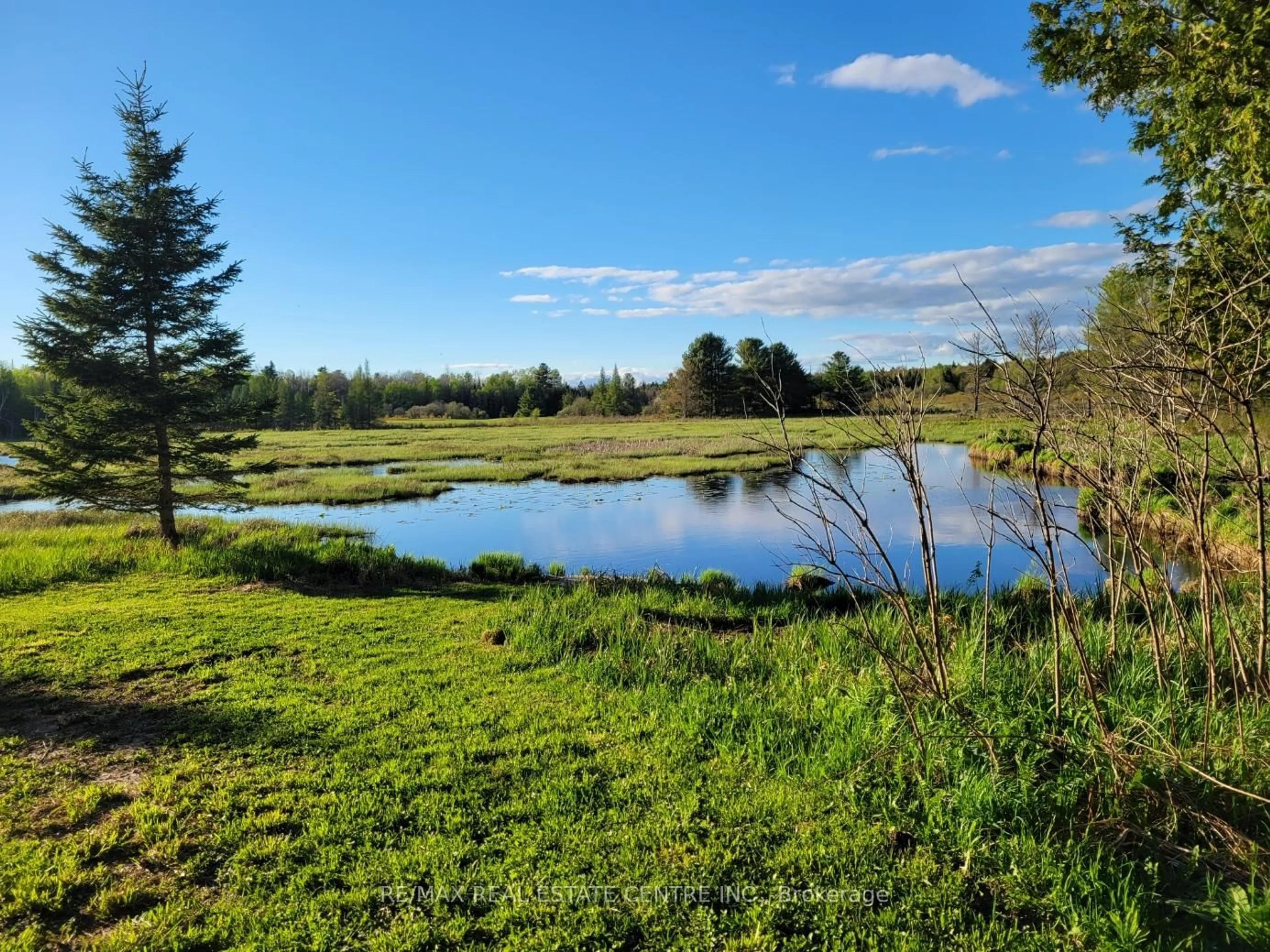 A pic from outside/outdoor area/front of a property/back of a property/a pic from drone, water/lake/river/ocean view for 1006 Hurdville Rd, McKellar Ontario P2A 0B5