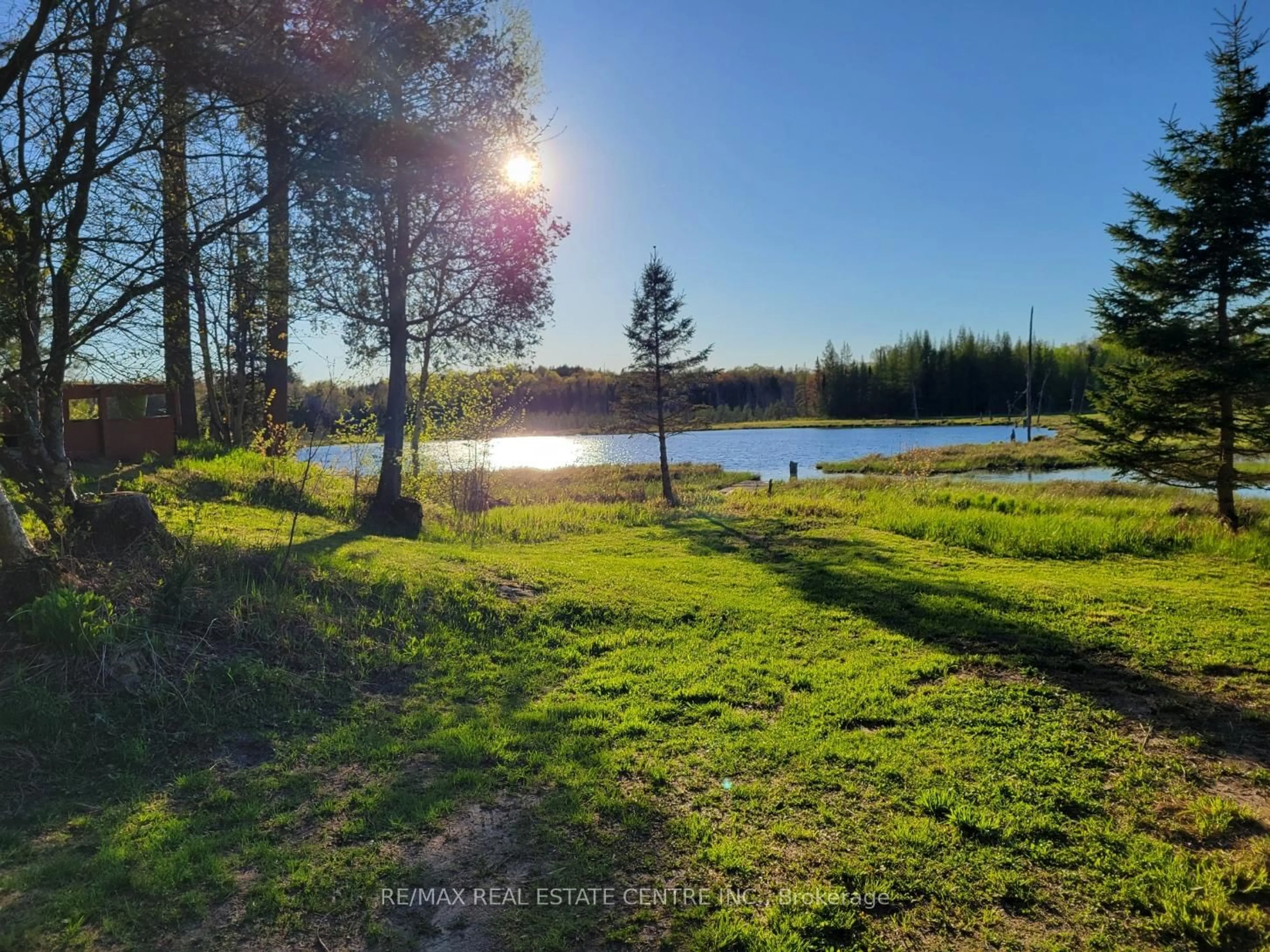 A pic from outside/outdoor area/front of a property/back of a property/a pic from drone, water/lake/river/ocean view for 1006 Hurdville Rd, McKellar Ontario P2A 0B5