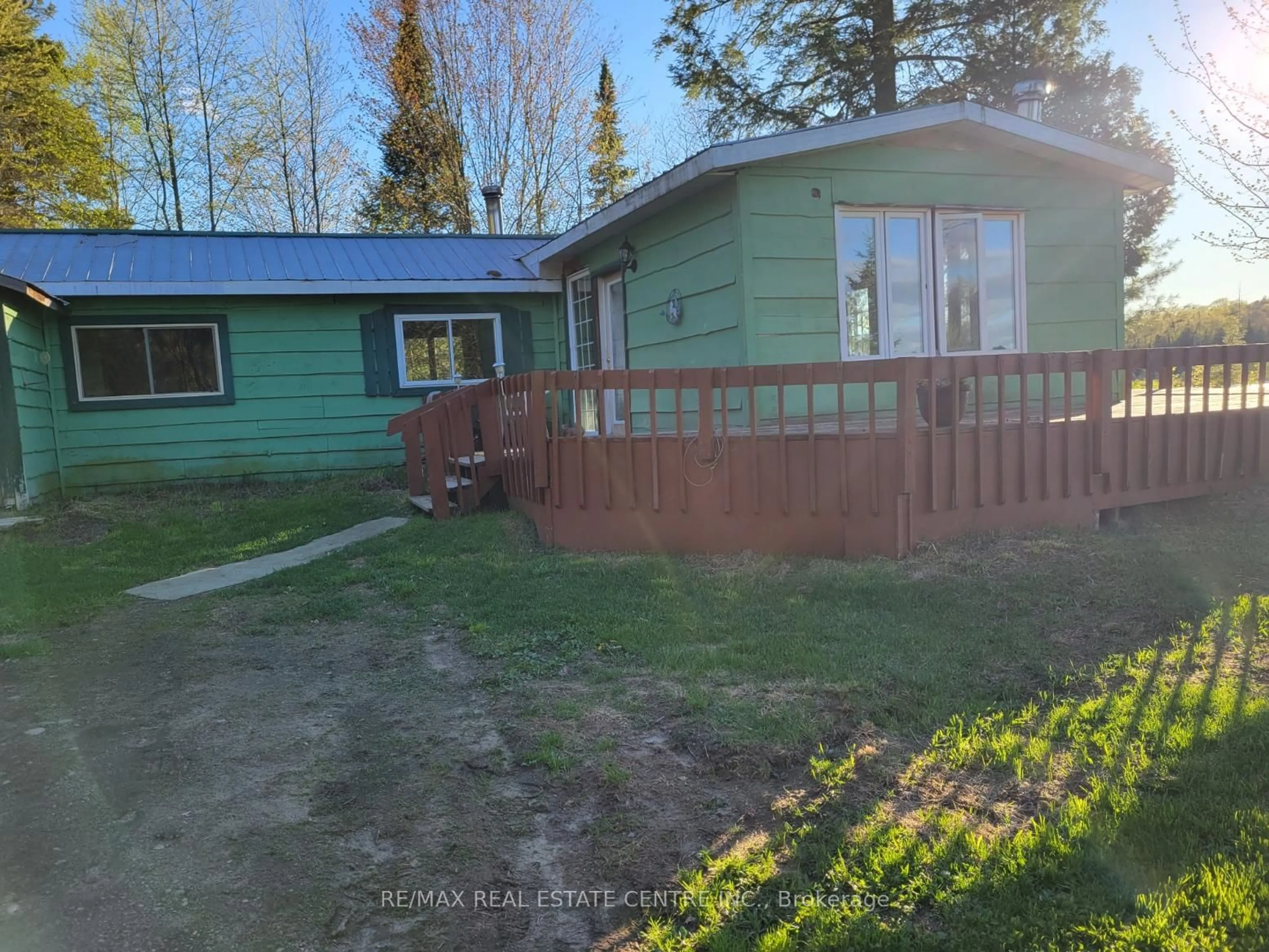 A pic from outside/outdoor area/front of a property/back of a property/a pic from drone, street for 1006 Hurdville Rd, McKellar Ontario P2A 0B5