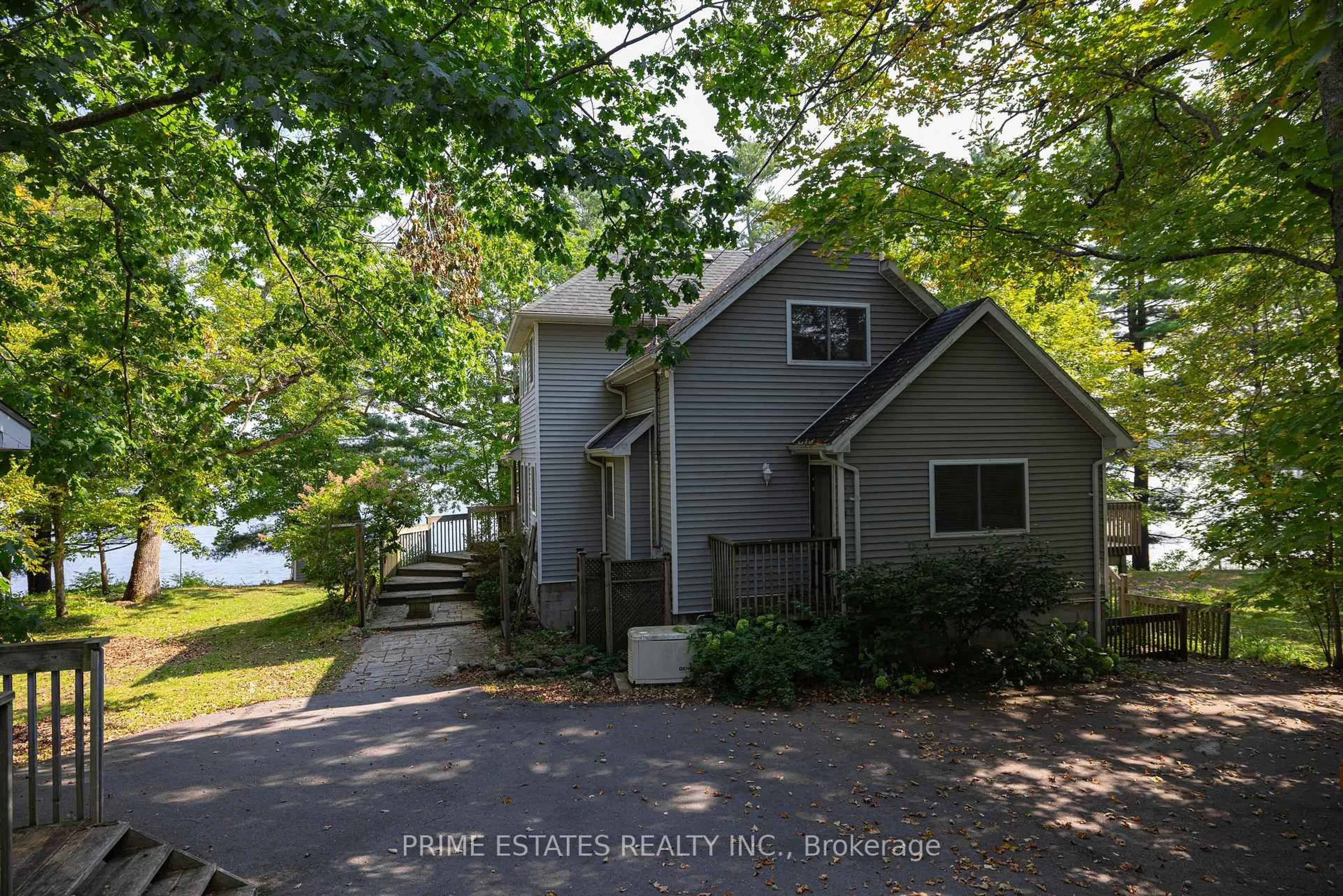 Home with vinyl exterior material, water/lake/river/ocean view for 1070 West Shore Lane, Godfrey Ontario K0H 1T0