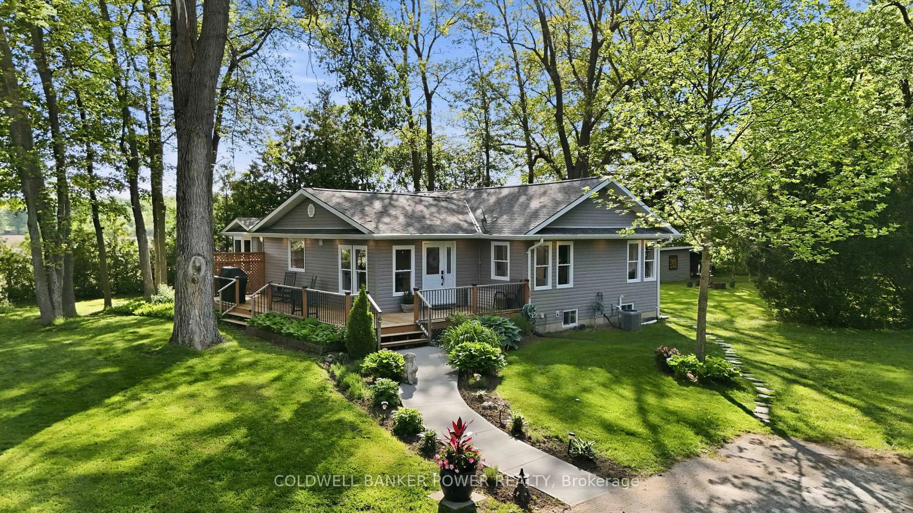 A pic from outside/outdoor area/front of a property/back of a property/a pic from drone, street for 26041 Queens Line, West Elgin Ontario N0L 2P0