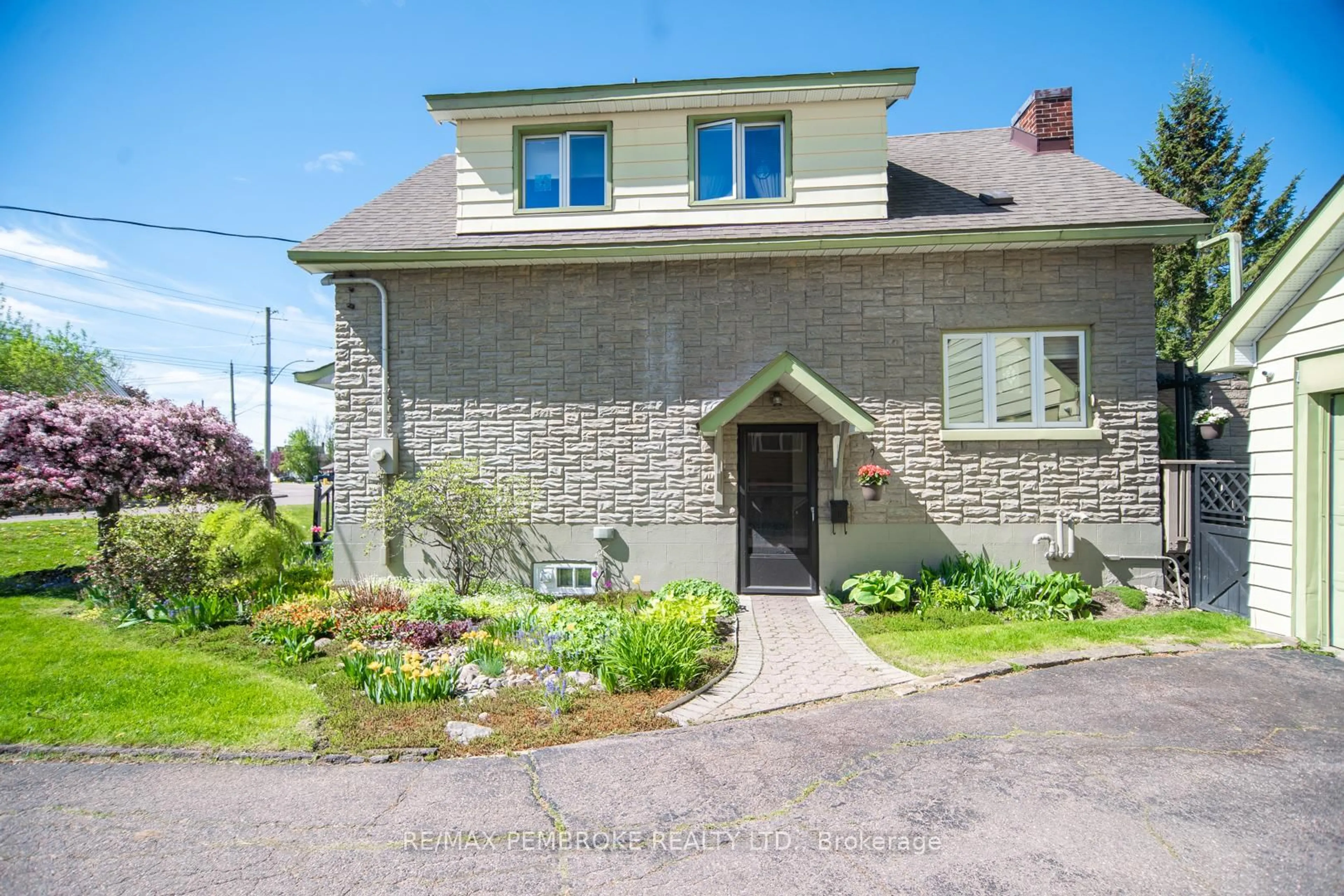 Home with brick exterior material, street for 554 EGANVILLE Rd, Pembroke Ontario K8A 4E8