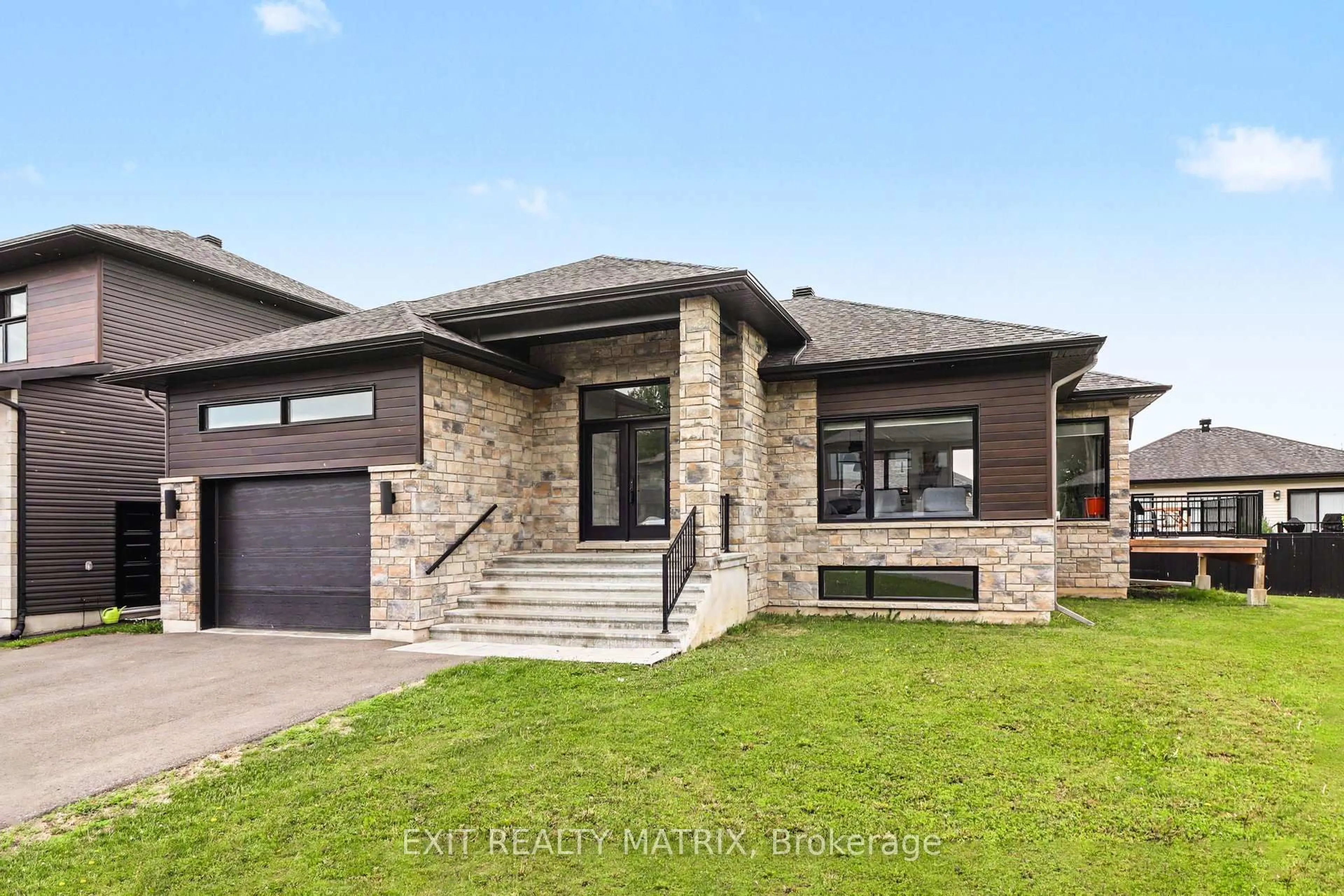 Home with brick exterior material, street for 225 Nature St, Casselman Ontario K0A 1M0