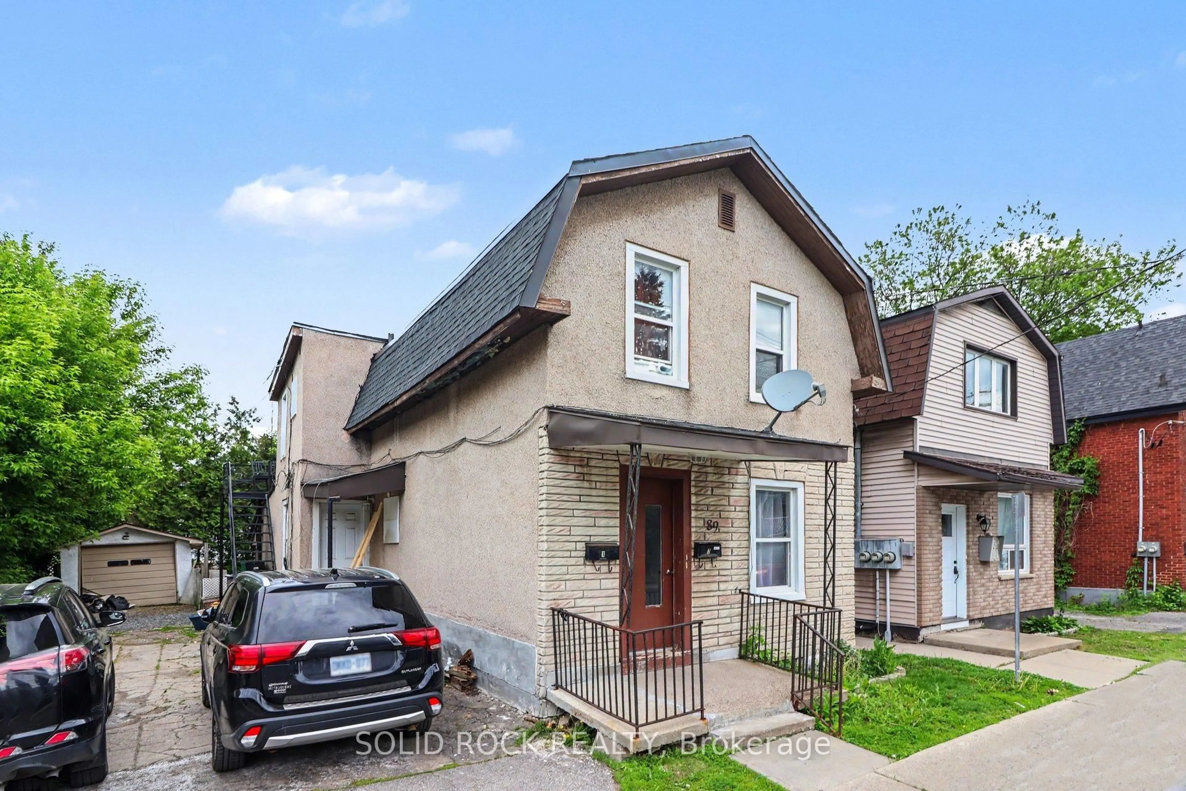Home with brick exterior material, street for 89 Marier Ave, Ottawa Ontario K1L 5S2
