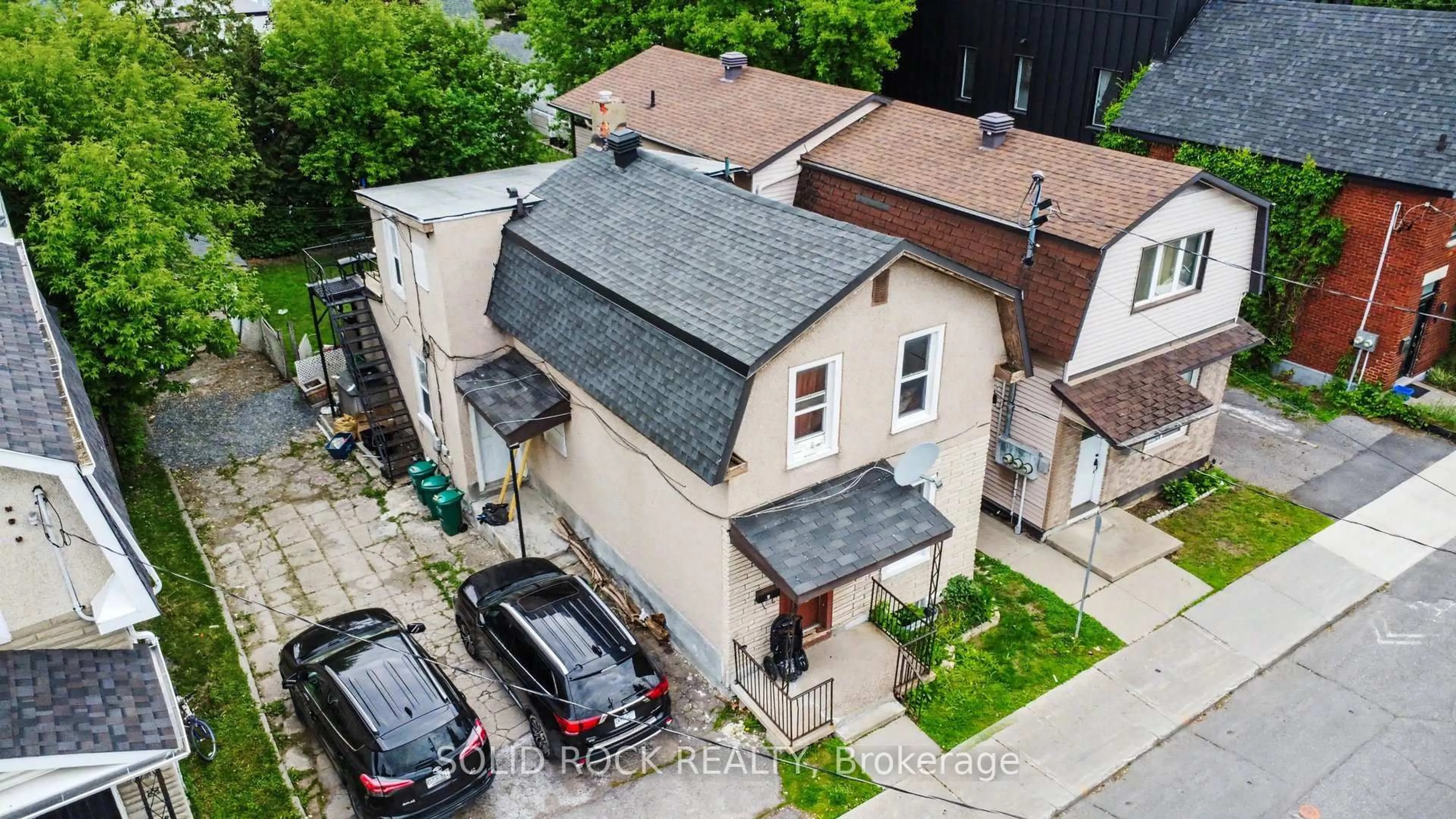 A pic from outside/outdoor area/front of a property/back of a property/a pic from drone, unknown for 89 Marier Ave, Ottawa Ontario K1L 5S2
