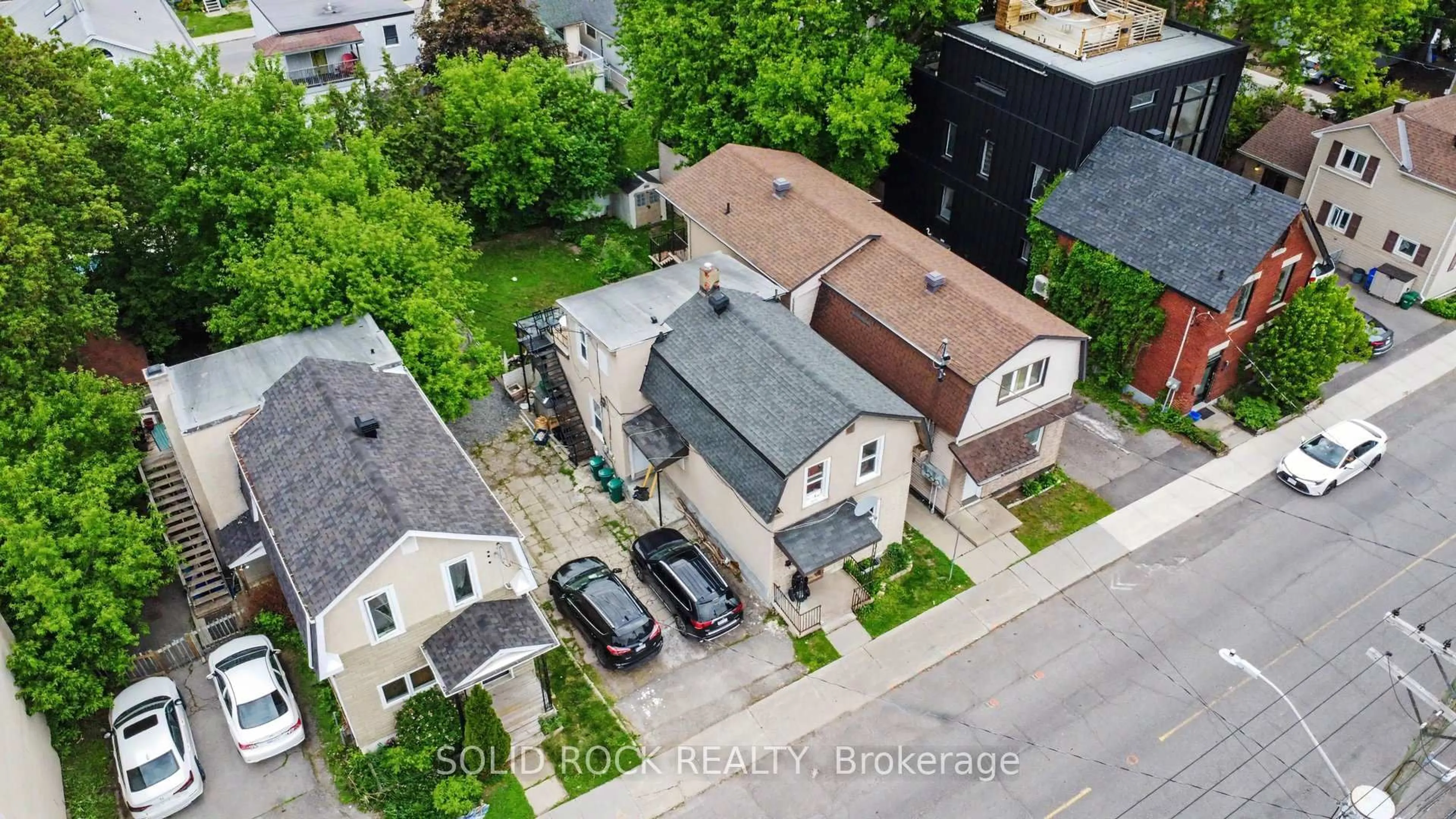 A pic from outside/outdoor area/front of a property/back of a property/a pic from drone, street for 89 Marier Ave, Ottawa Ontario K1L 5S2
