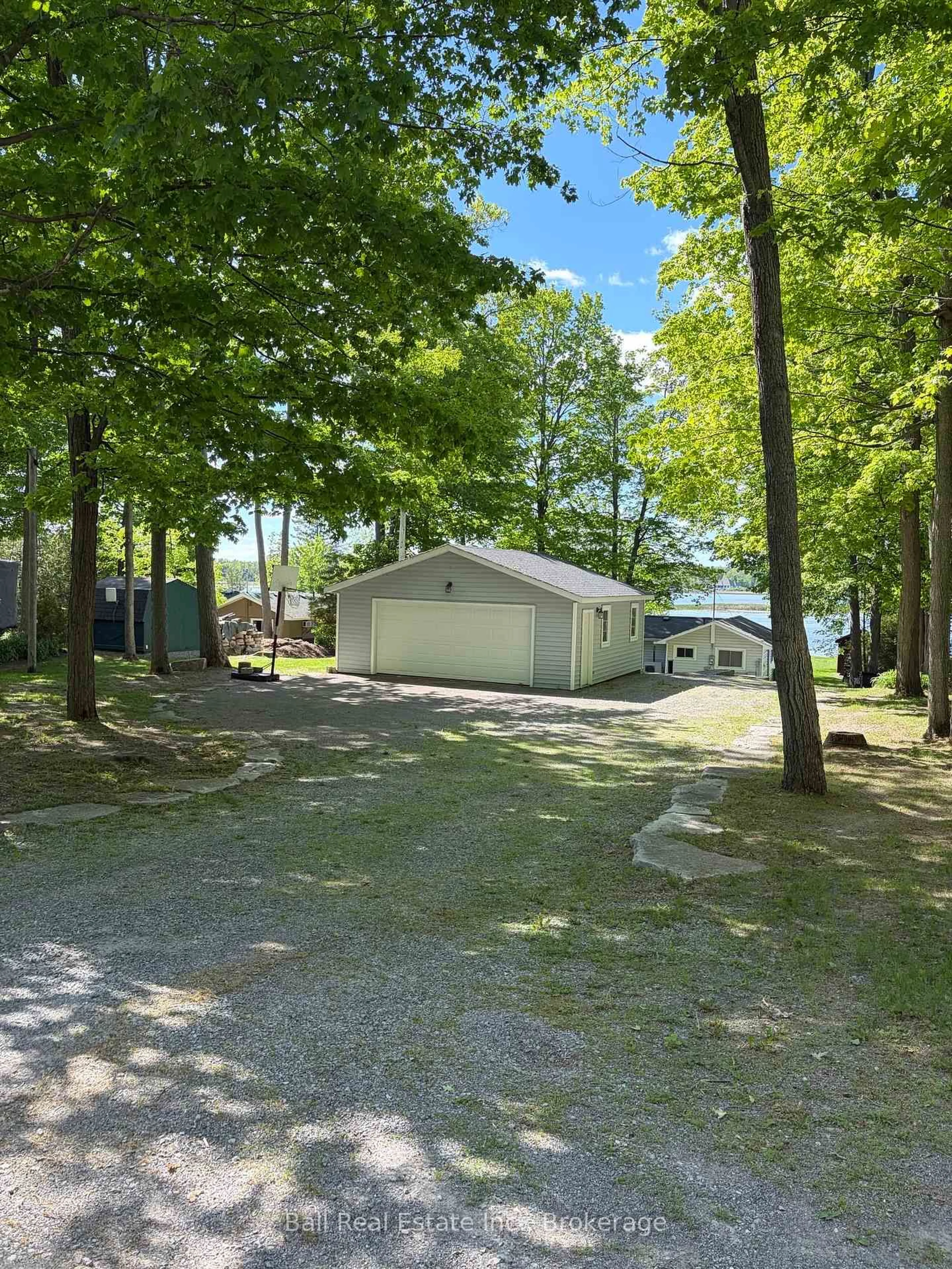 A pic from outside/outdoor area/front of a property/back of a property/a pic from drone, street for 58 Woodland Tr, Trent Lakes Ontario K0L 1J0
