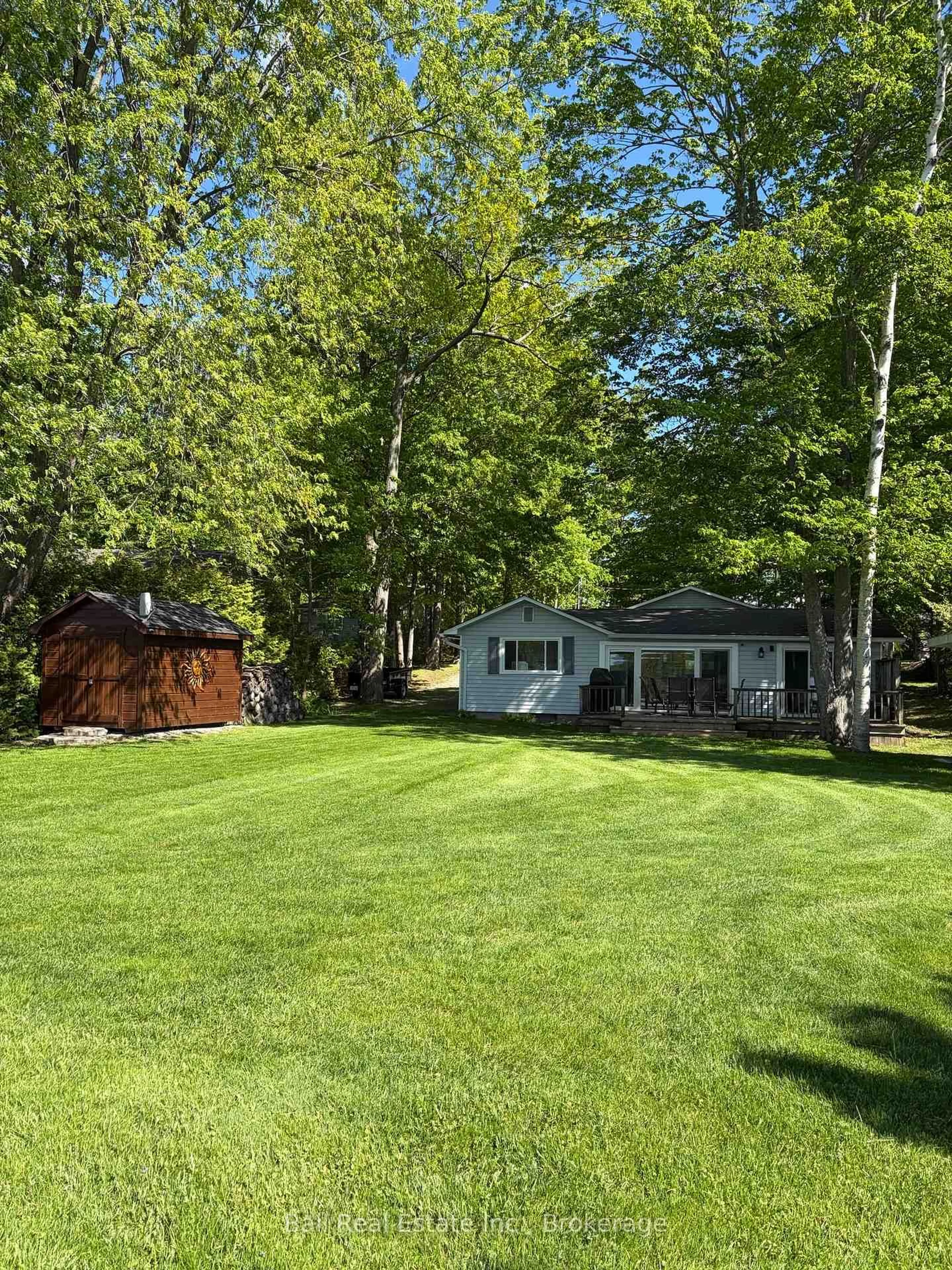 A pic from outside/outdoor area/front of a property/back of a property/a pic from drone, unknown for 58 Woodland Tr, Trent Lakes Ontario K0L 1J0