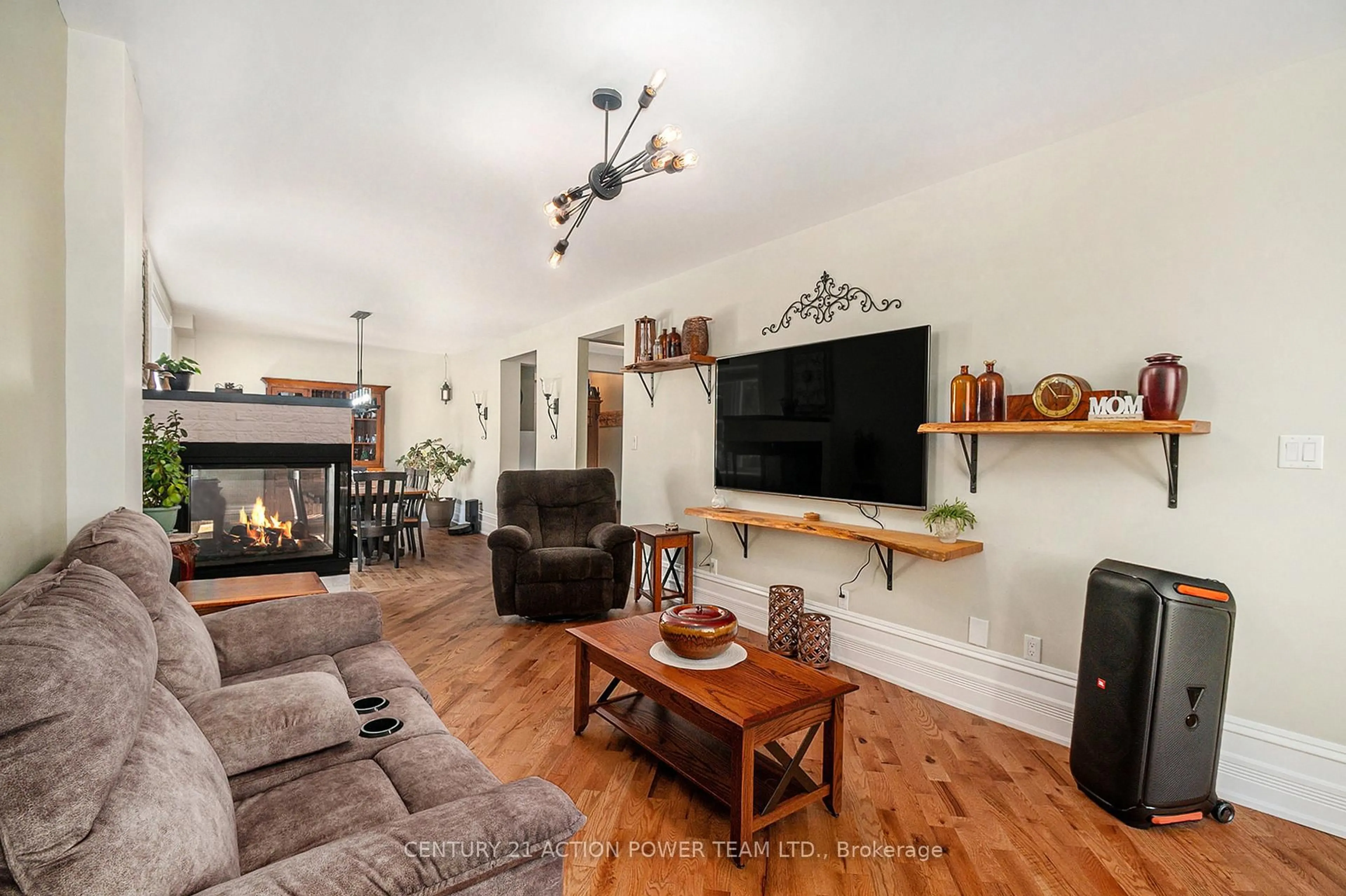 Living room with furniture, wood/laminate floor for 1674 Landry St, Clarence-Rockland Ontario K0A 1N0