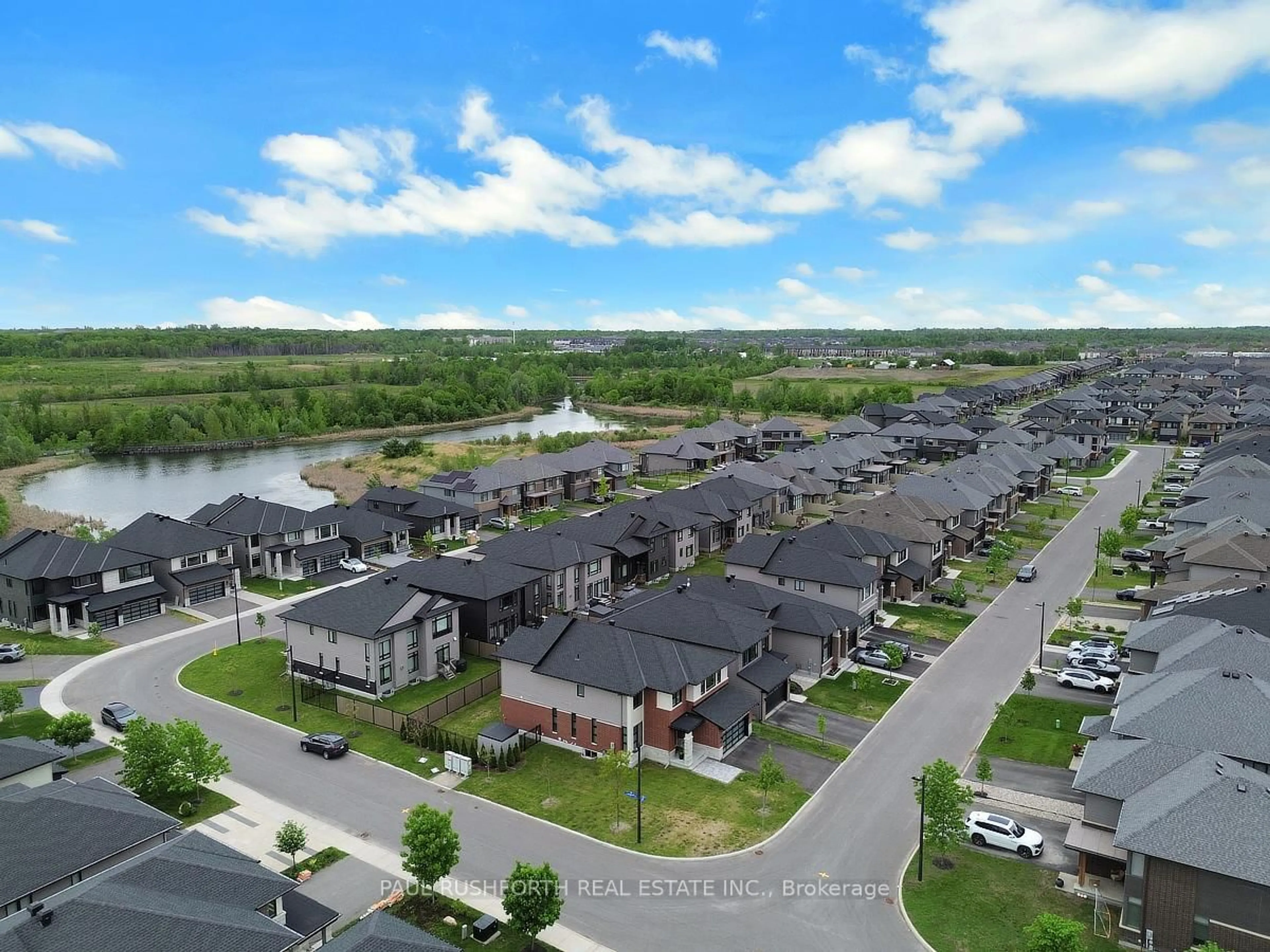 A pic from outside/outdoor area/front of a property/back of a property/a pic from drone, water/lake/river/ocean view for 970 Islington Way, Ottawa Ontario K1T 0T9