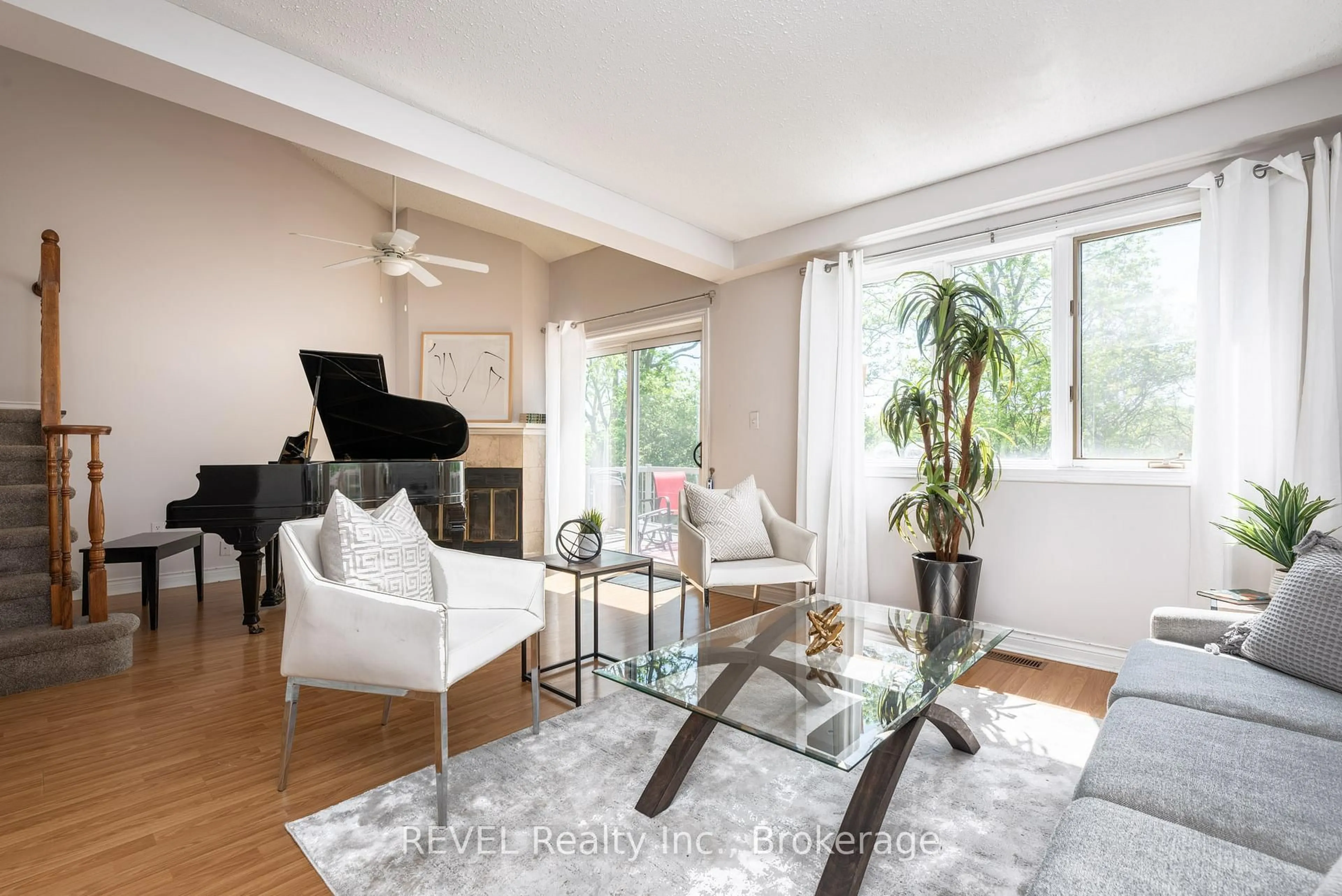 Living room with furniture, wood/laminate floor for 275 Pelham Rd #49, St. Catharines Ontario L2S 3B9