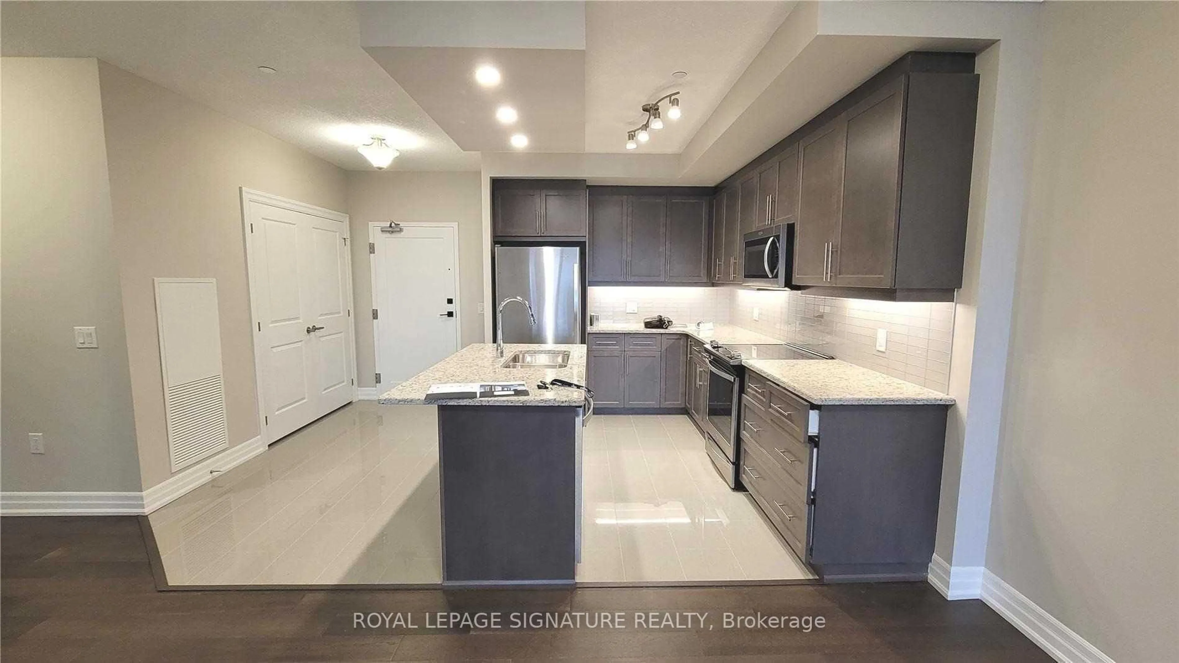 Open concept kitchen, ceramic/tile floor for 1878 Gordon St #506, Guelph Ontario N1L 0P4
