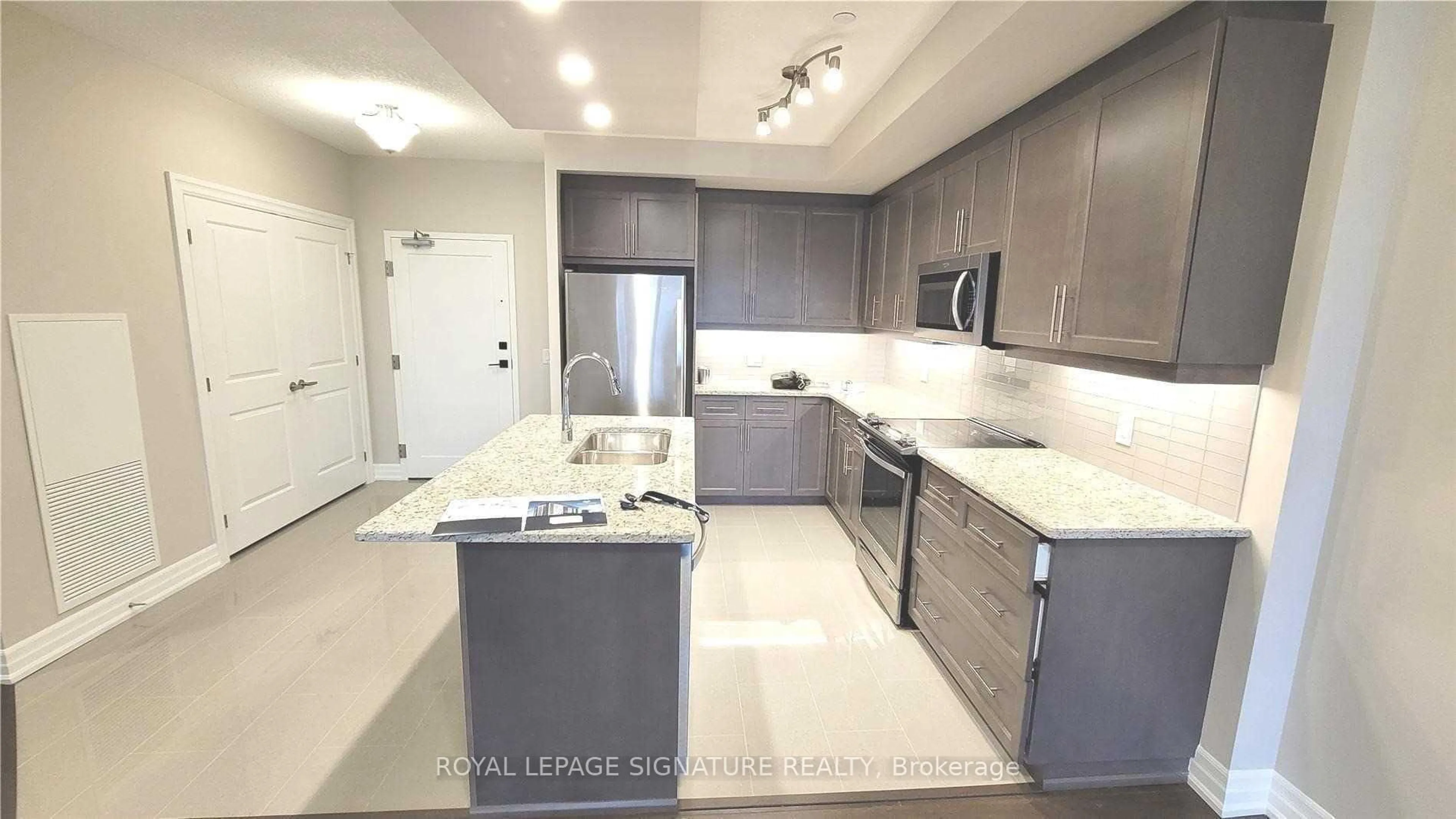 Open concept kitchen, ceramic/tile floor for 1878 Gordon St #506, Guelph Ontario N1L 0P4