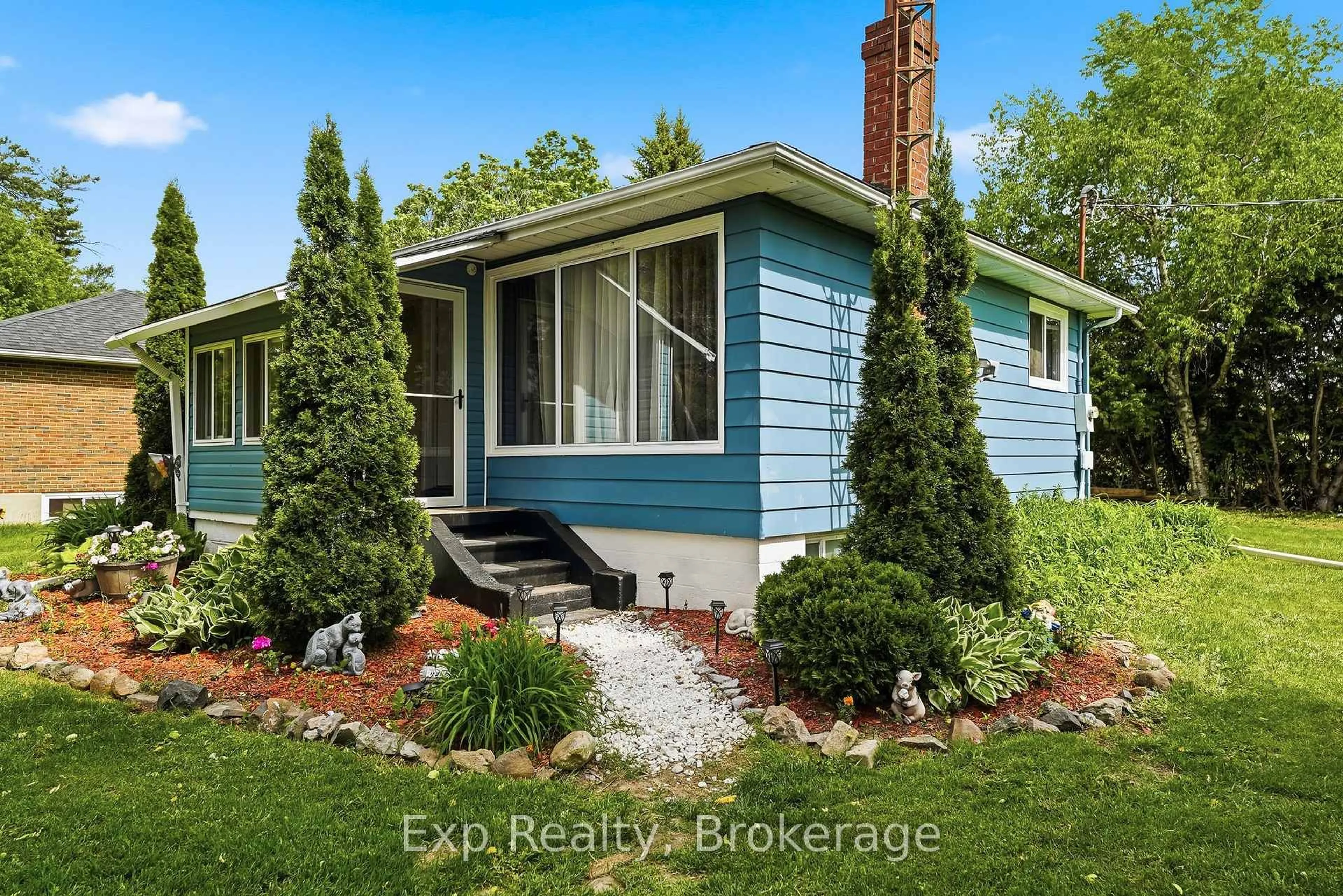 Home with vinyl exterior material, street for 7497 Cavan Rd, Hamilton Township Ontario K0L 1E0