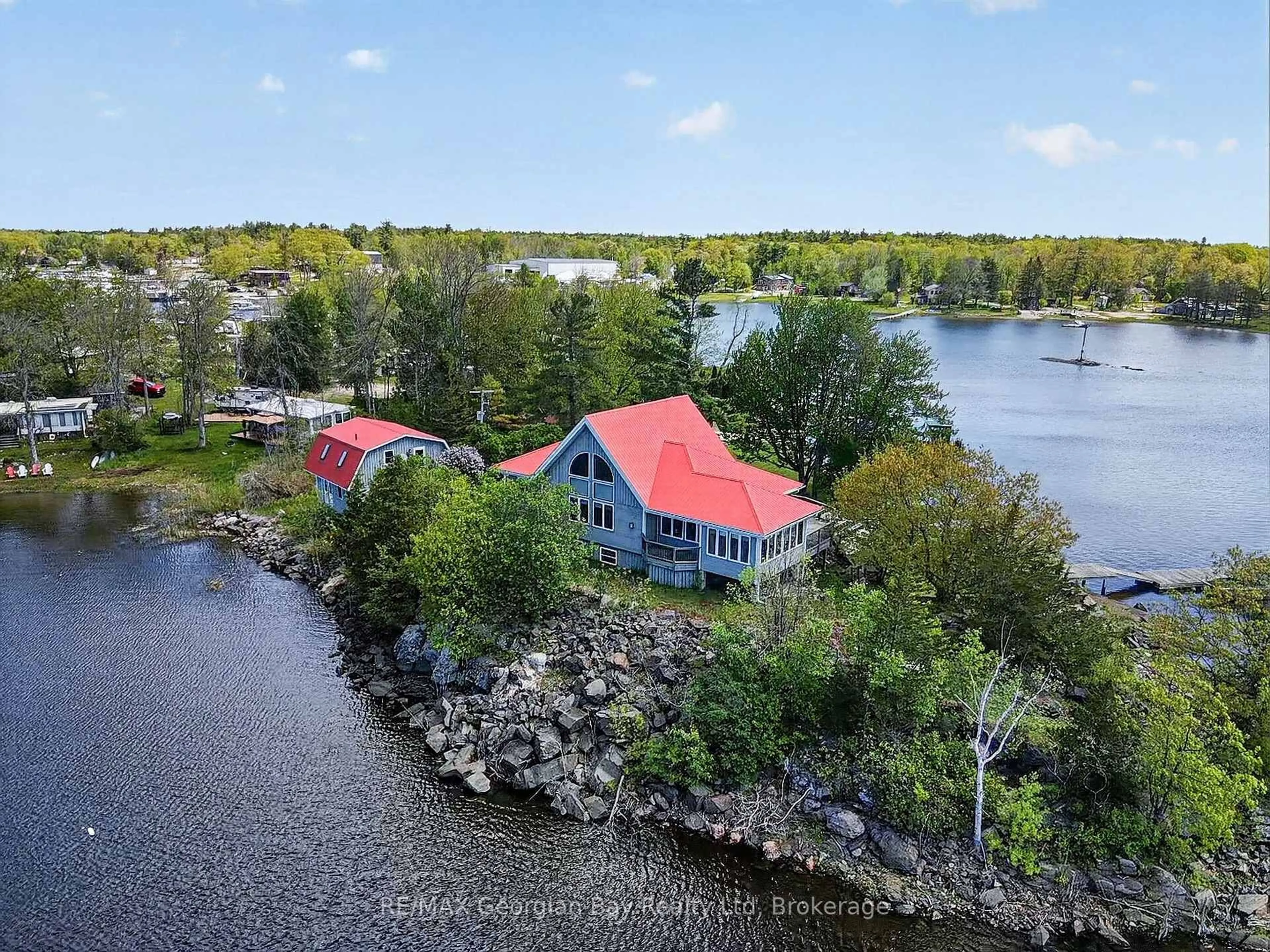 A pic from outside/outdoor area/front of a property/back of a property/a pic from drone, water/lake/river/ocean view for 185 Picnic Island Rd, Georgian Bay Ontario L0K 1S0