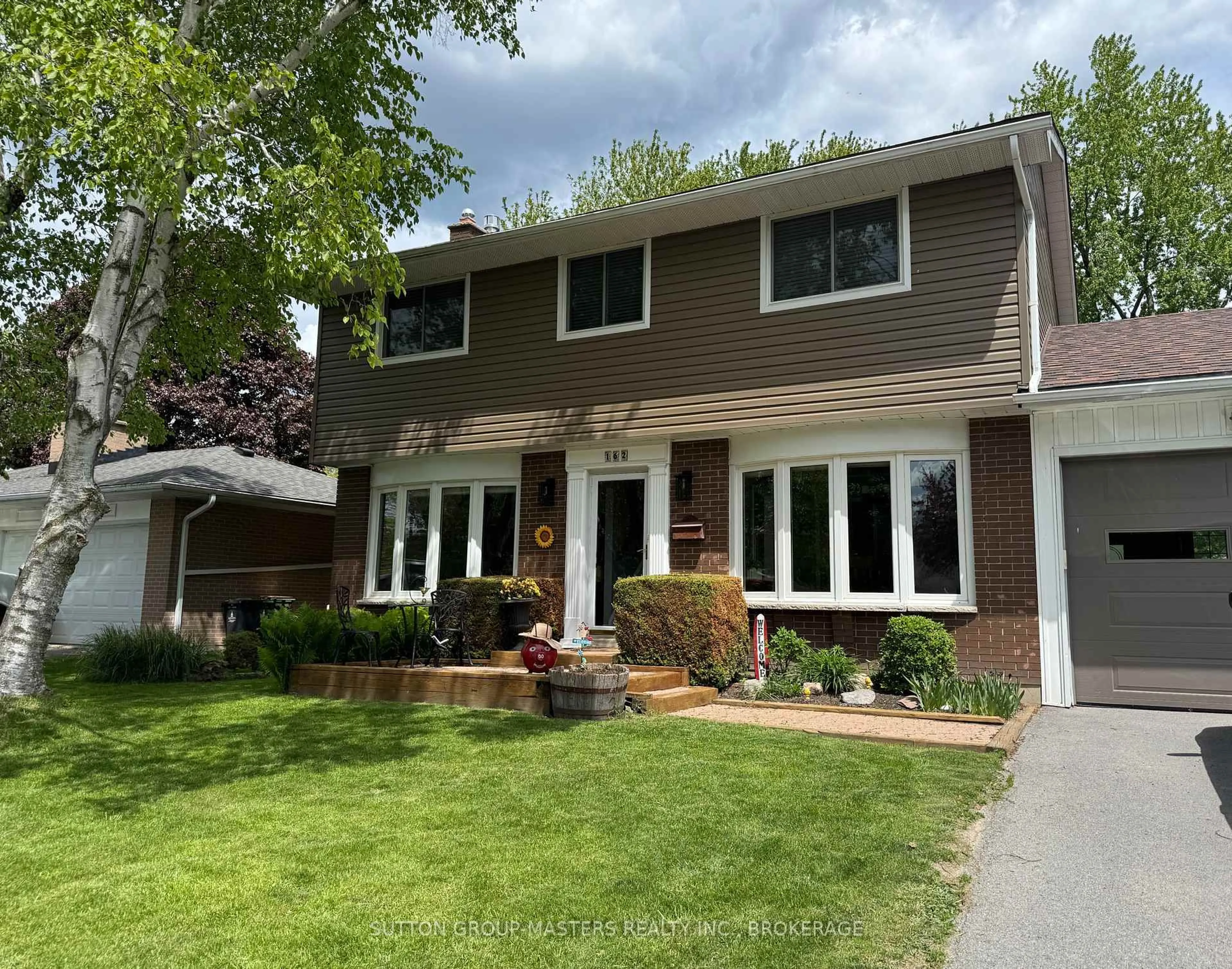 Home with vinyl exterior material, street for 162 Chelsea Rd, Kingston Ontario K7M 3Y8