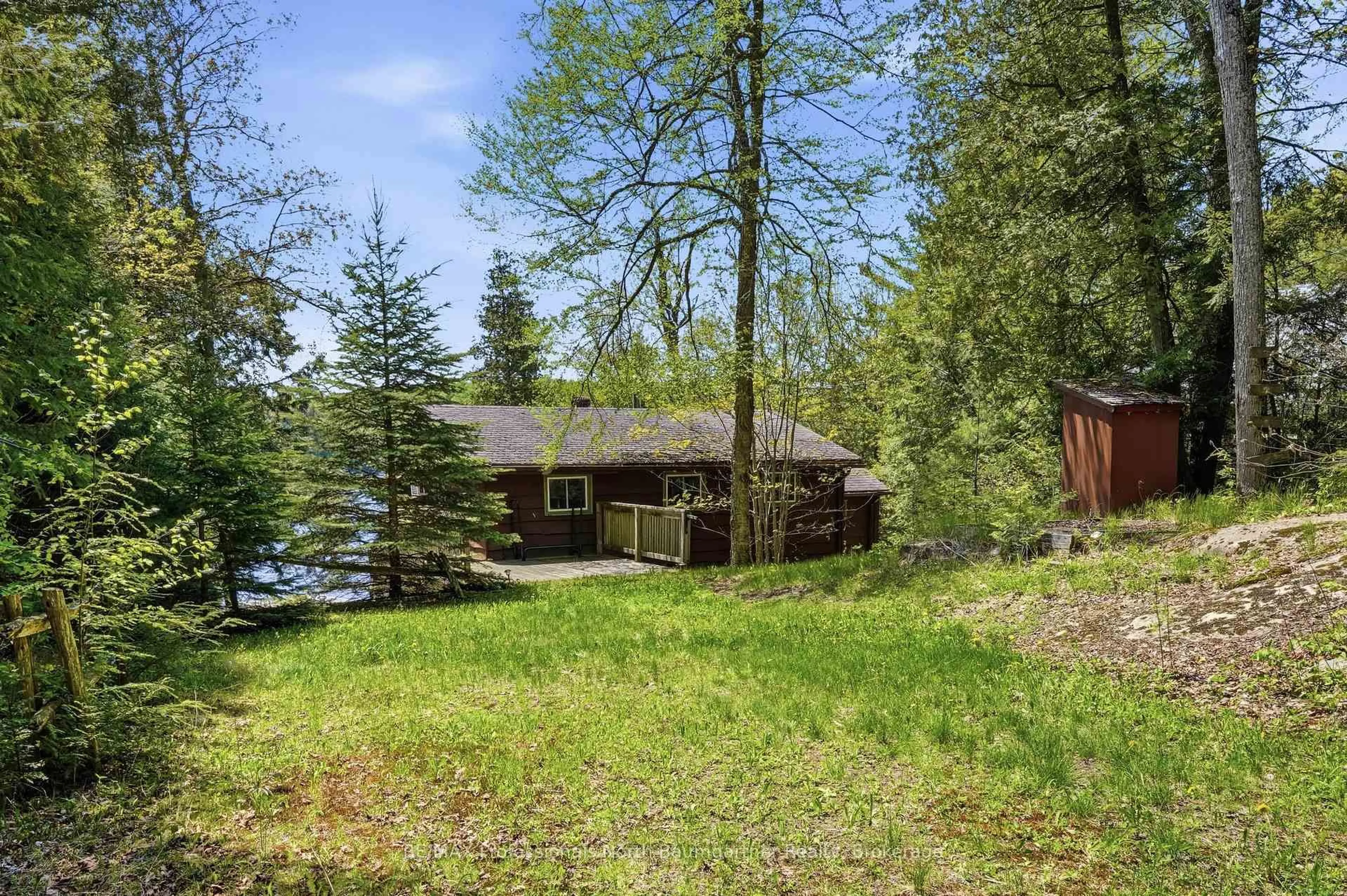 A pic from outside/outdoor area/front of a property/back of a property/a pic from drone, forest/trees view for 1320 Little Straggle Lake Dr, Dysart et al Ontario K0L 1M1