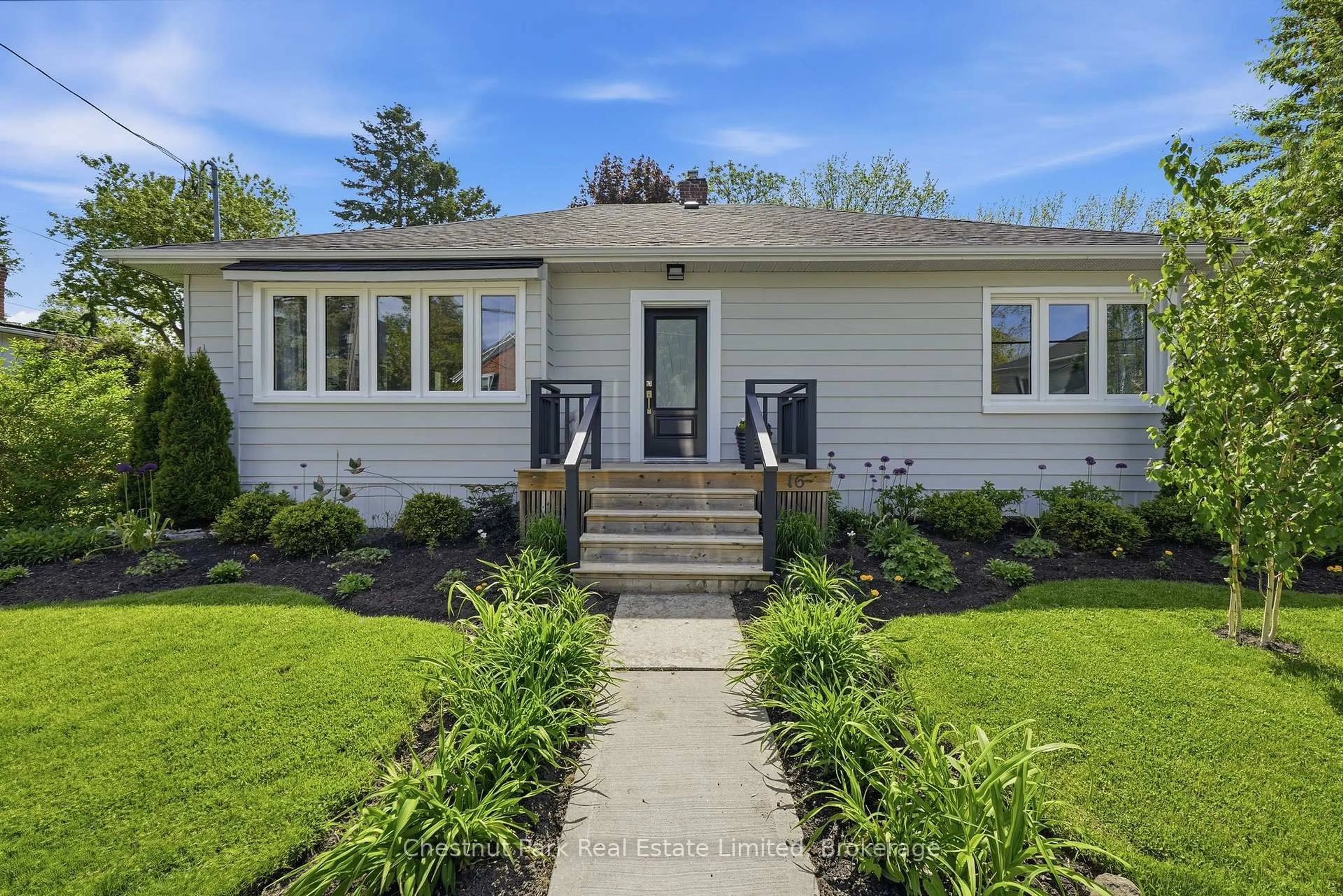 Home with vinyl exterior material, street for 16 Jane St, Prince Edward County Ontario K0K 2T0