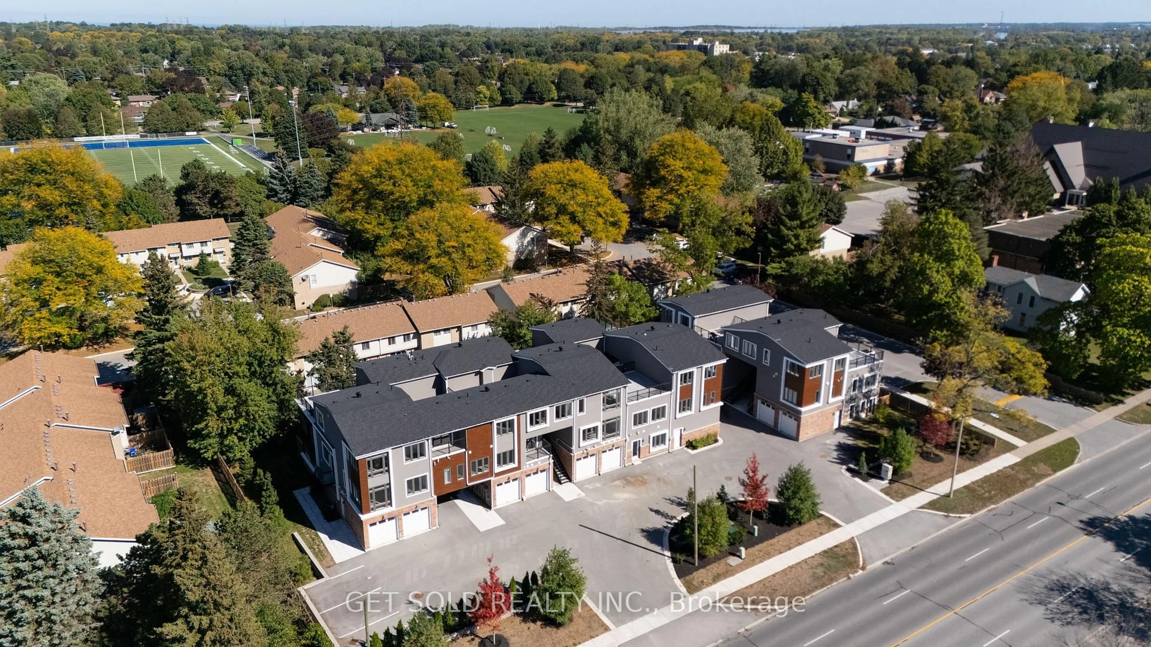 A pic from outside/outdoor area/front of a property/back of a property/a pic from drone, unknown for 6701 Thorold Stone Rd #8, Niagara Falls Ontario L2J 1B3
