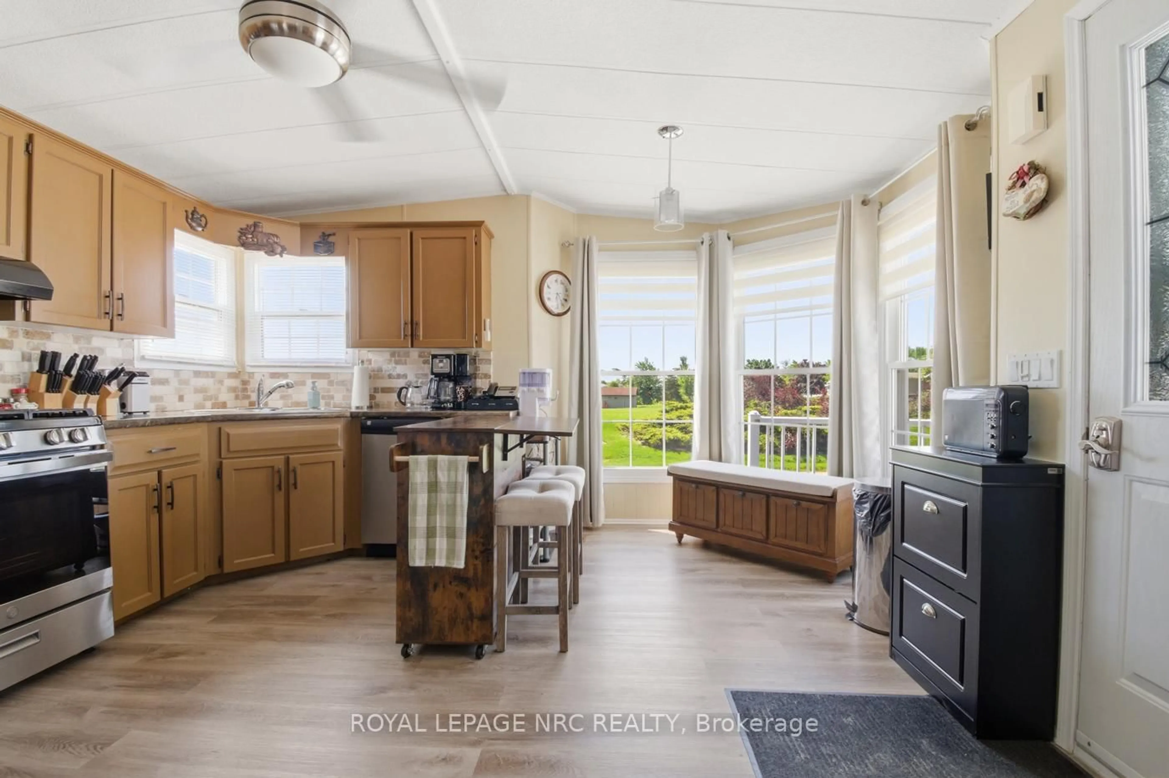 Open concept kitchen, ceramic/tile floor for 3033 Townline Rd #77, Fort Erie Ontario L0S 1S1
