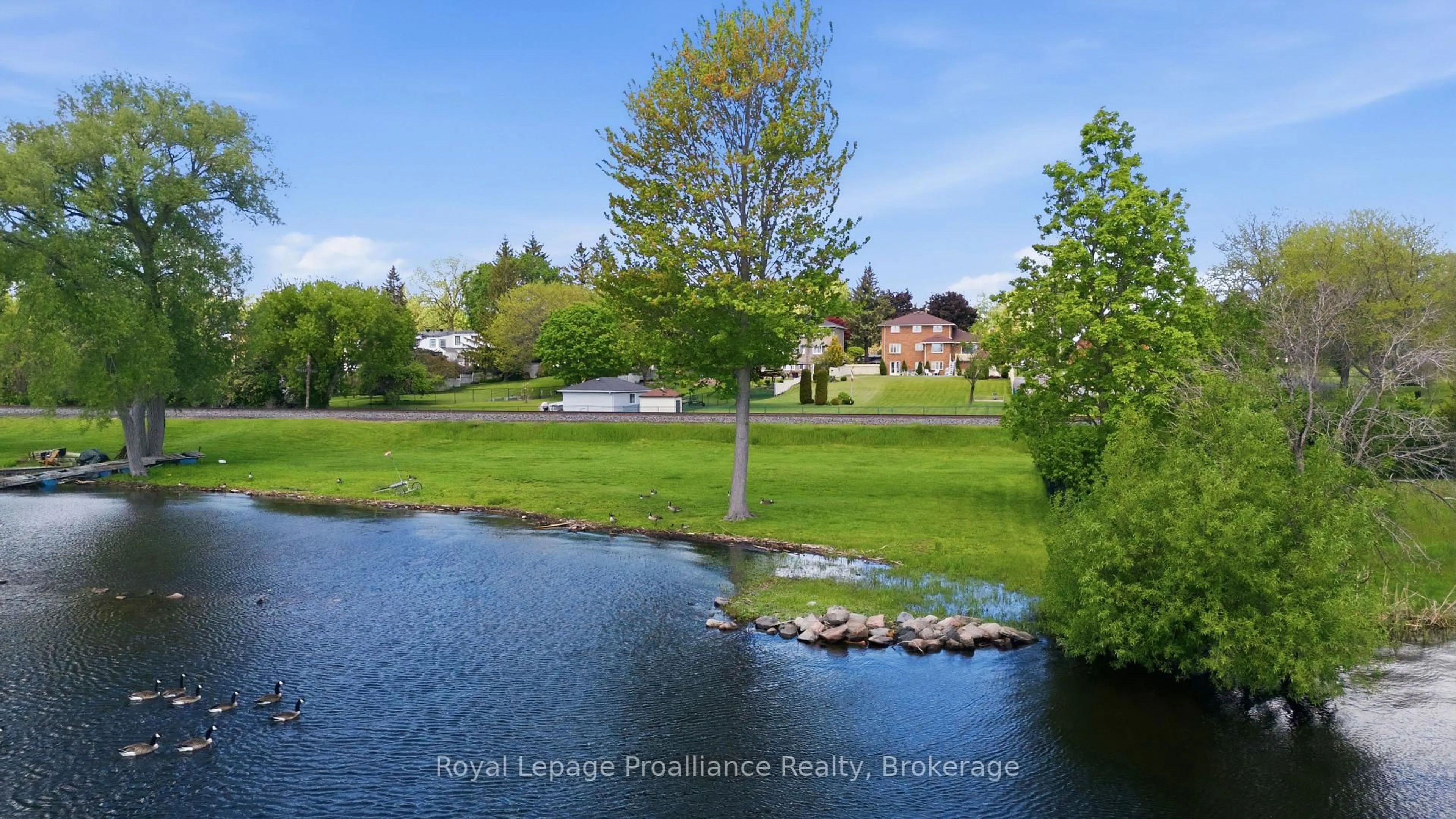 A pic from outside/outdoor area/front of a property/back of a property/a pic from drone, water/lake/river/ocean view for 261 Dundas St, Belleville Ontario K8P 1A8