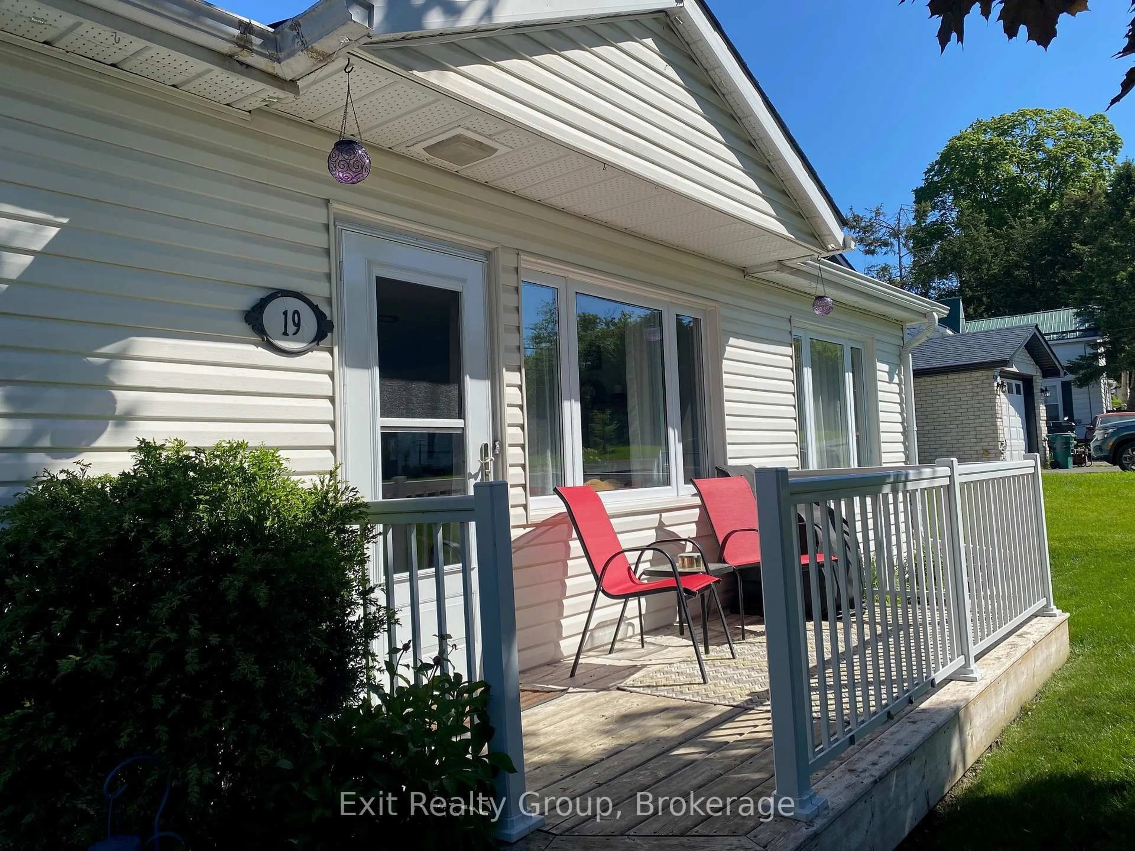 Home with vinyl exterior material, street for 19 Belleville St, Hastings Ontario K0K 2C0