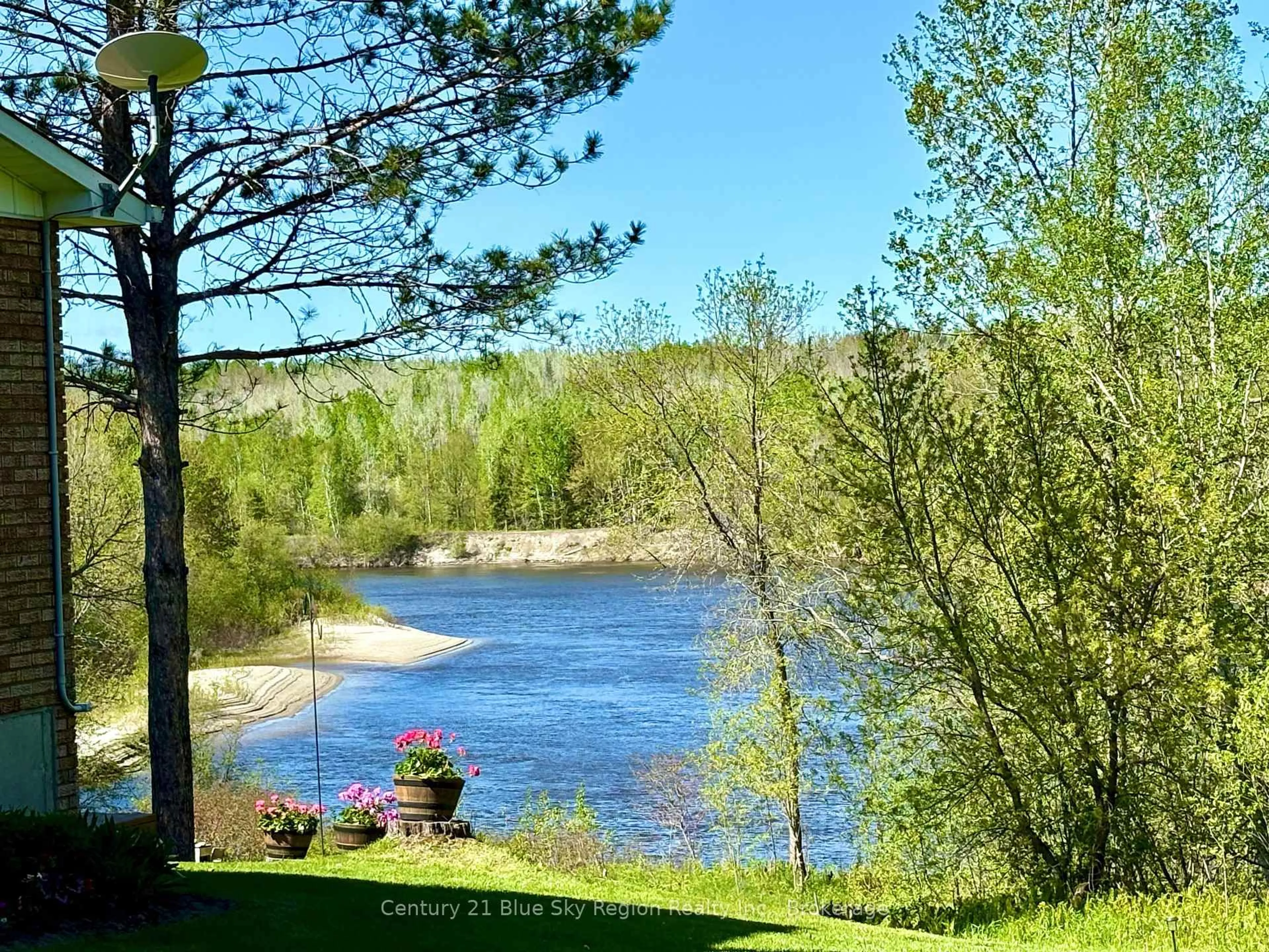 A pic from outside/outdoor area/front of a property/back of a property/a pic from drone, water/lake/river/ocean view for 13588 Highway 64, West Nipissing Ontario P0H 1M0