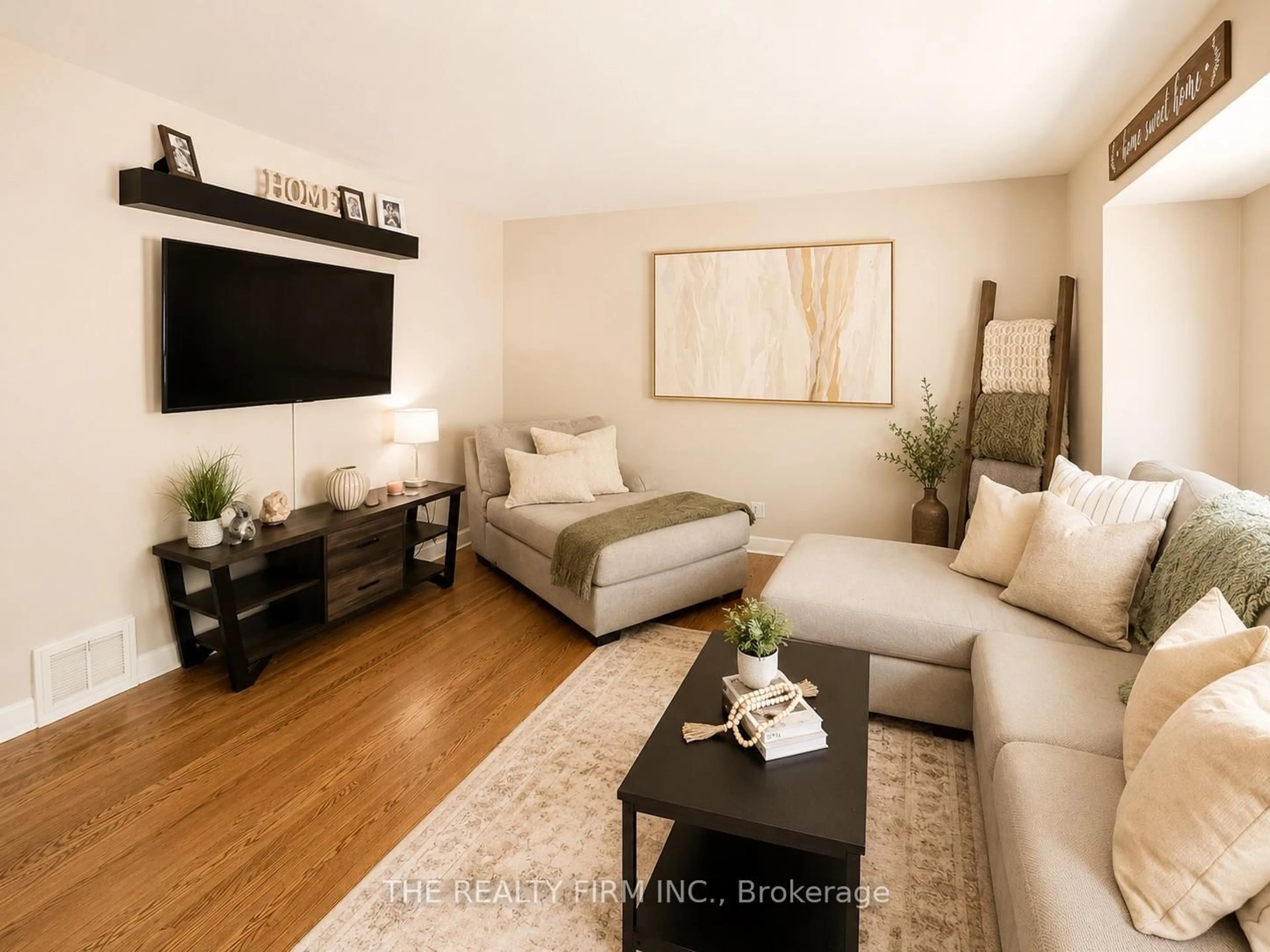 Living room with furniture, wood/laminate floor for 75 Stevenson Ave, London East Ontario N5W 1Y4