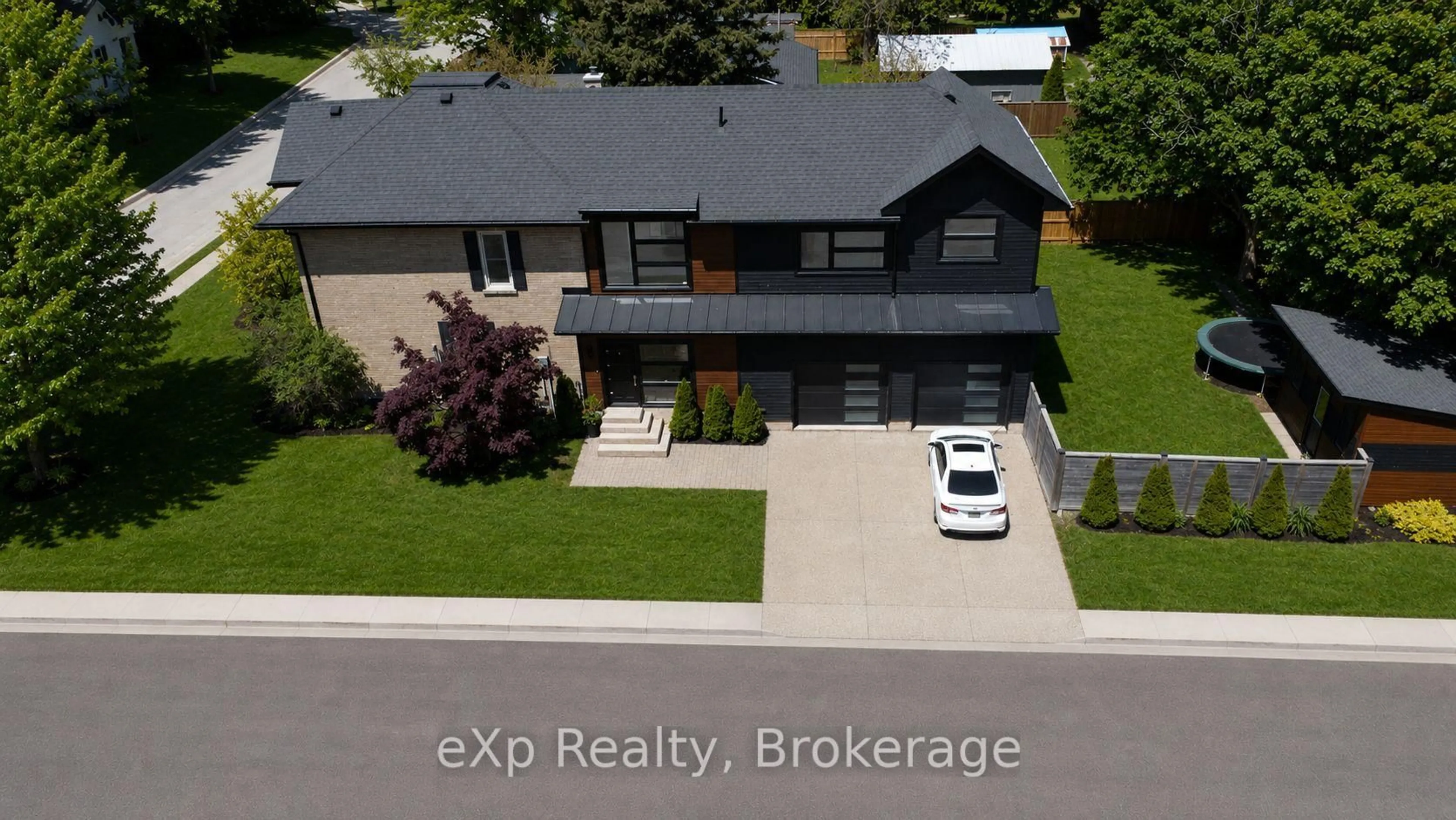 A pic from outside/outdoor area/front of a property/back of a property/a pic from drone, street for 709 Green St, Saugeen Shores Ontario N0H 2C0