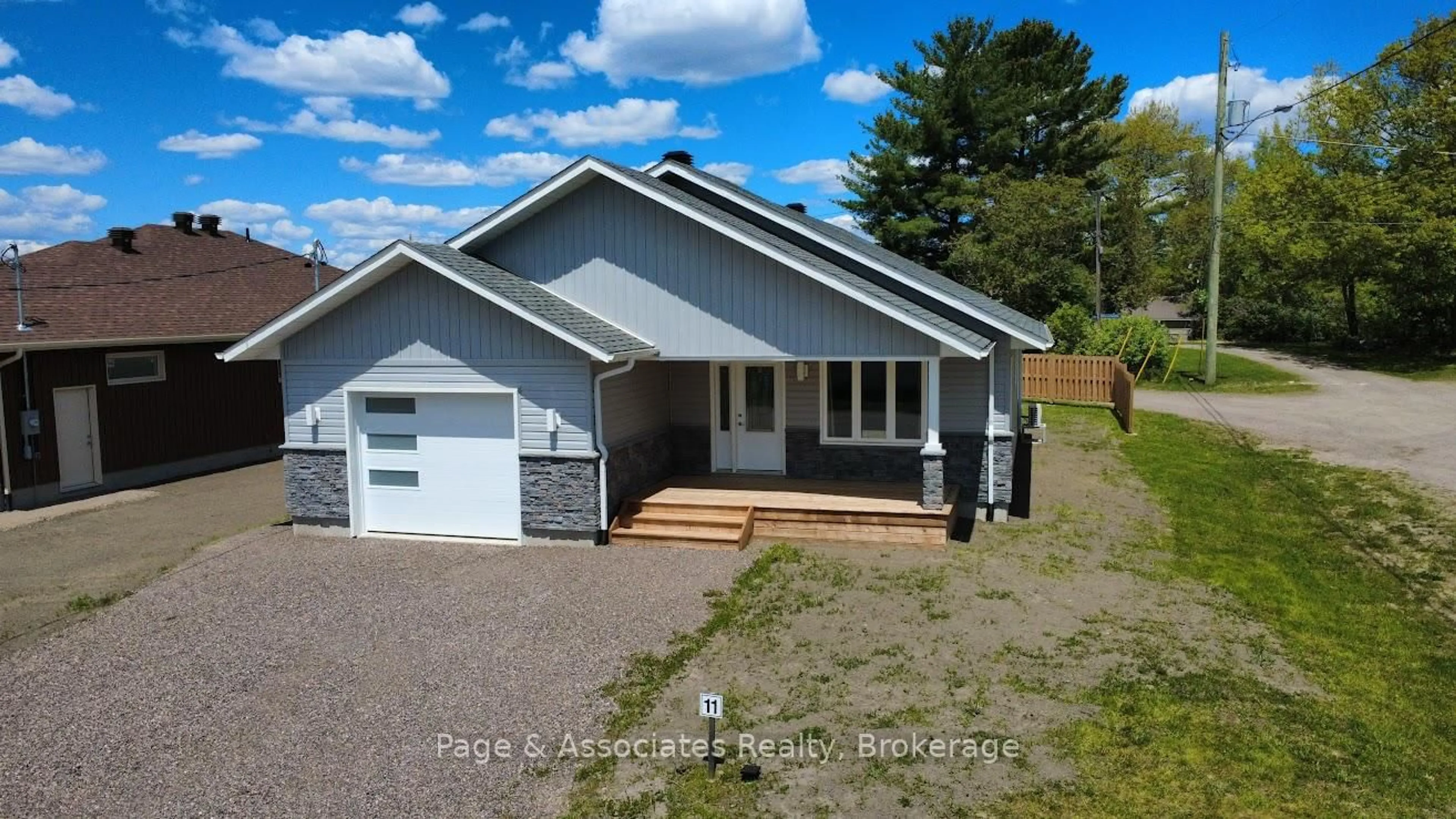 A pic from outside/outdoor area/front of a property/back of a property/a pic from drone, unknown for 1 Moon Crt, West Nipissing Ontario P2B 3E6