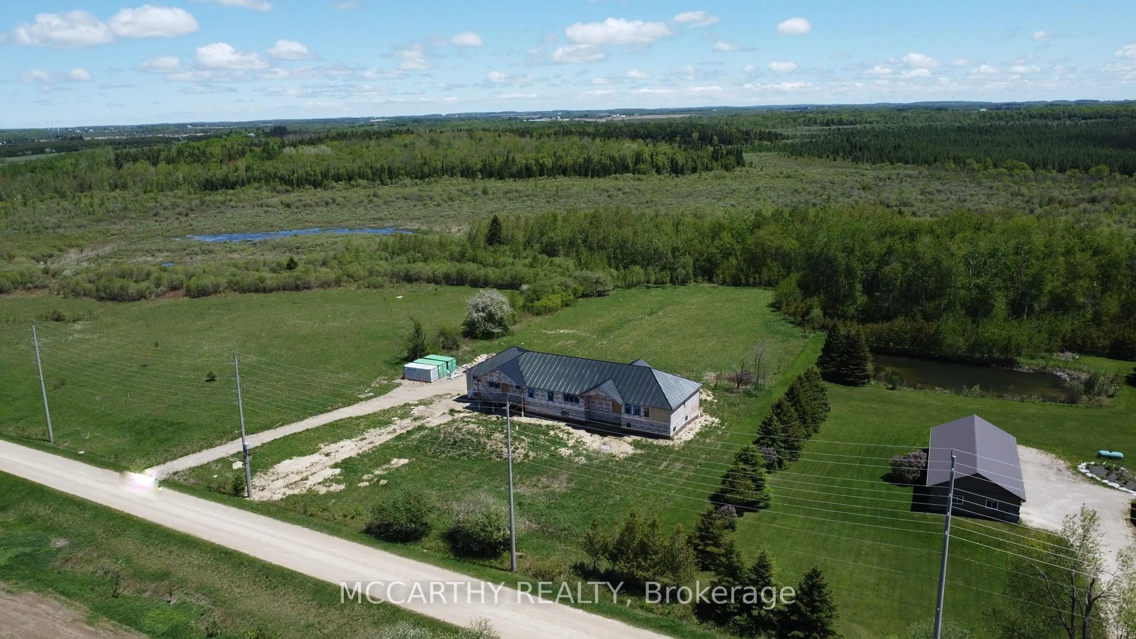 A pic from outside/outdoor area/front of a property/back of a property/a pic from drone, water/lake/river/ocean view for 214459 10th Line, Amaranth Ontario L9W 0G7