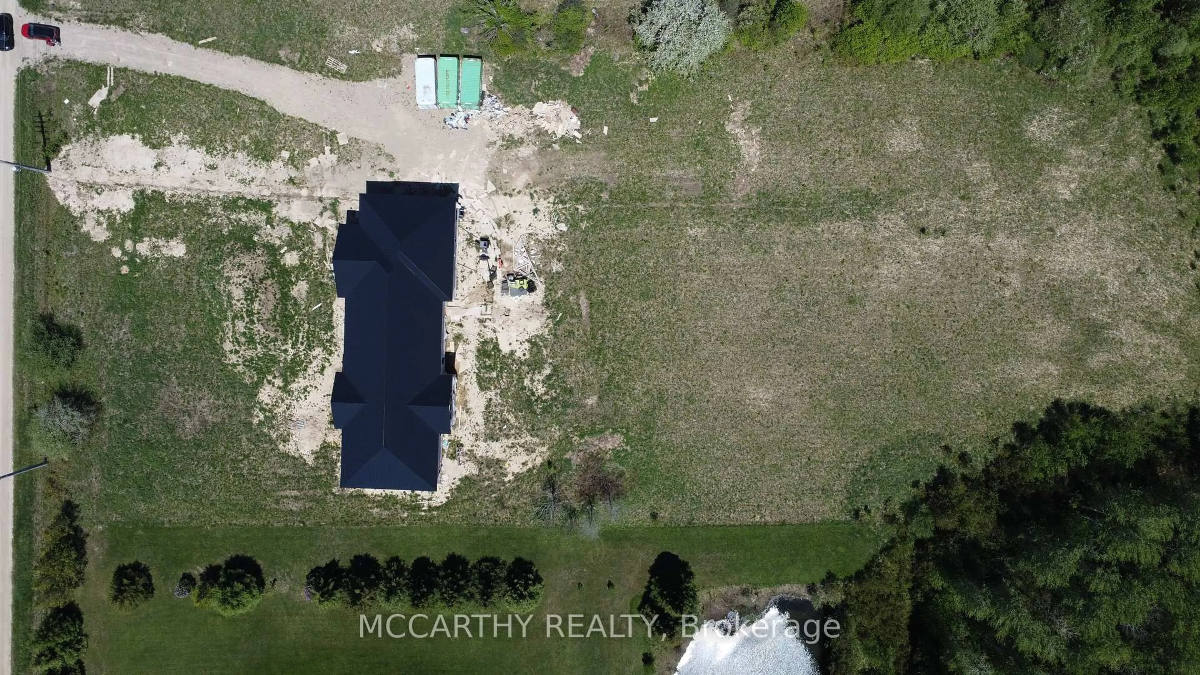 A pic from outside/outdoor area/front of a property/back of a property/a pic from drone, unknown for 214459 10th Line, Amaranth Ontario L9W 0G7