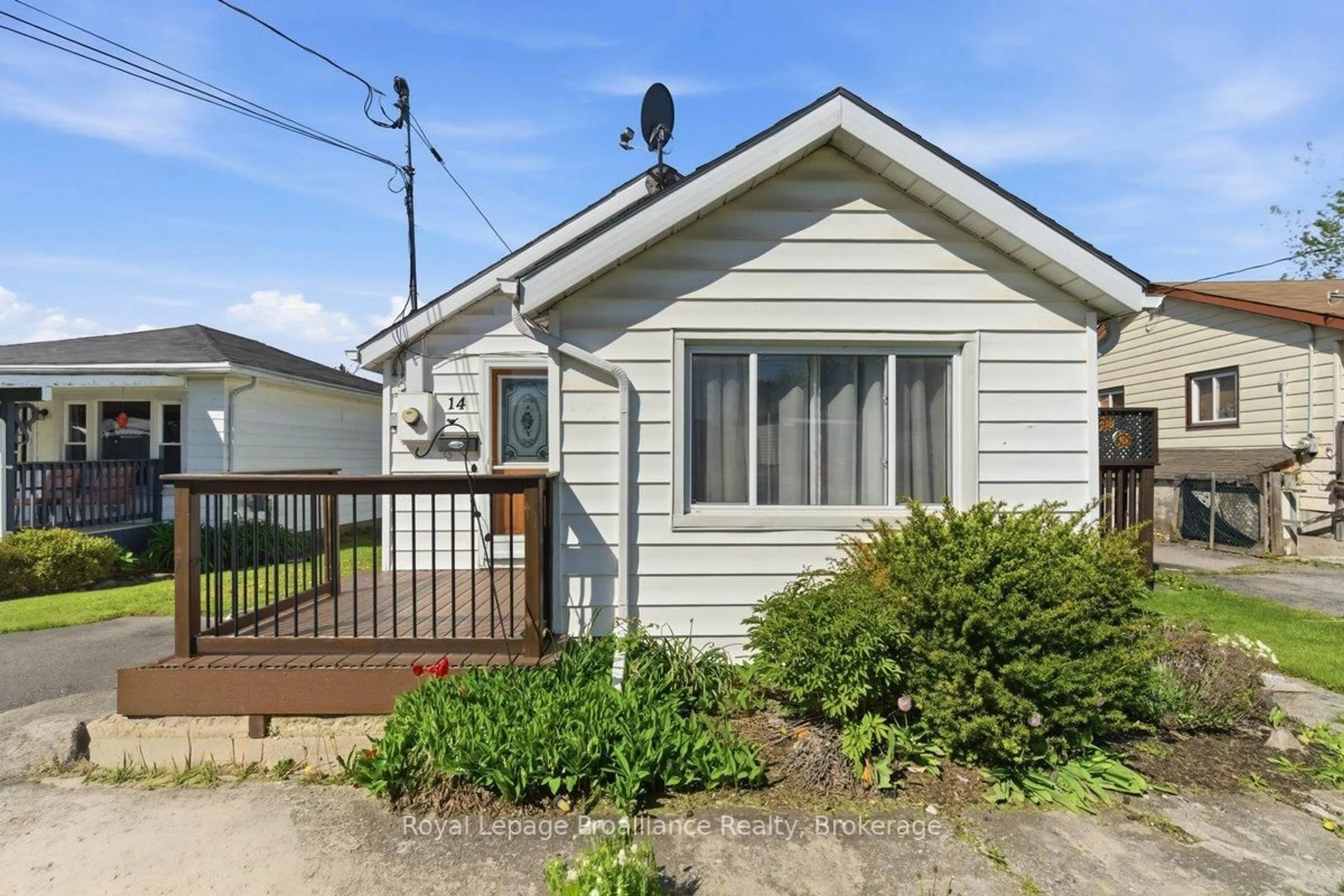 Home with vinyl exterior material, street for 14 Ramsay Ave, Quinte West Ontario K8V 2P5
