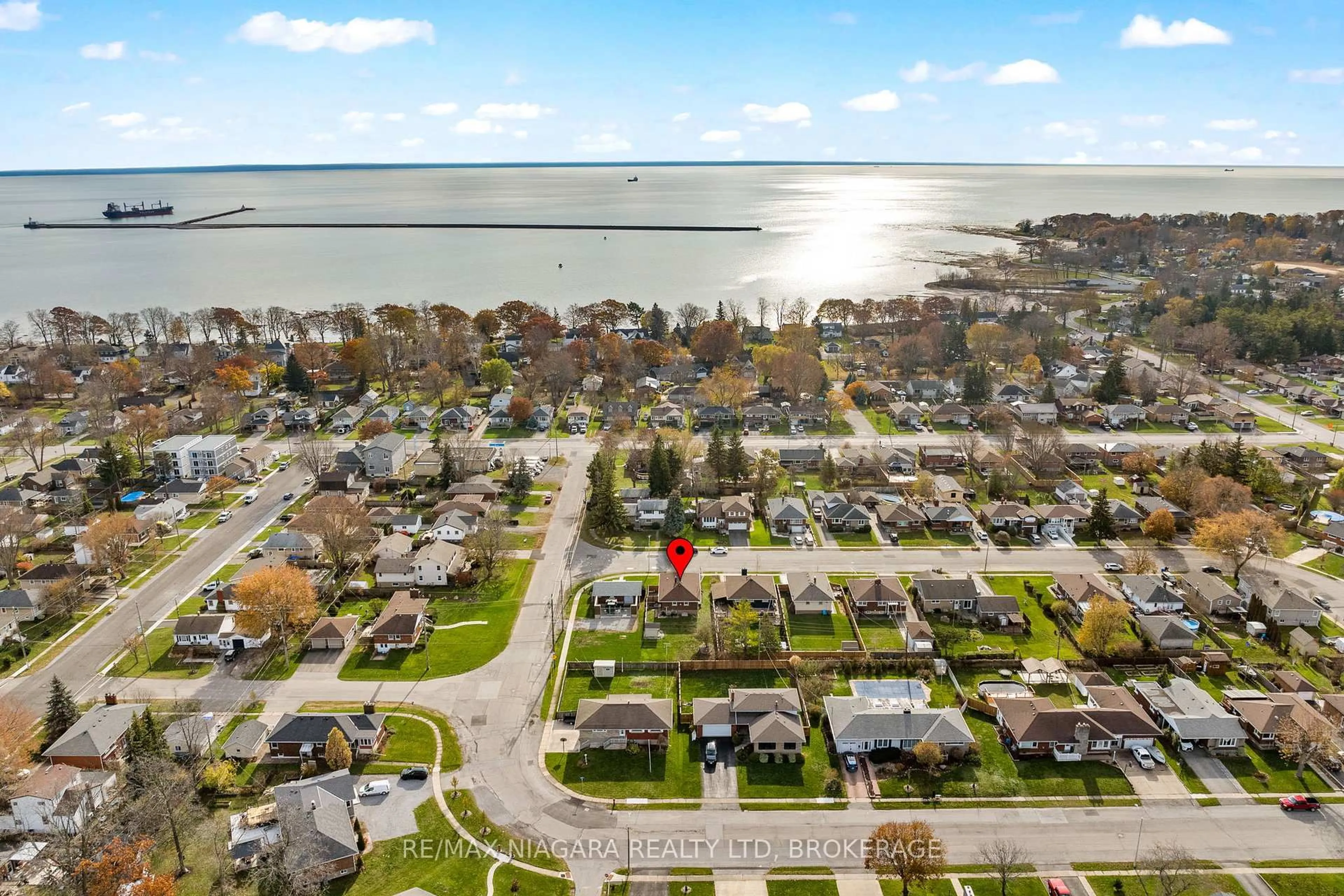 A pic from outside/outdoor area/front of a property/back of a property/a pic from drone, water/lake/river/ocean view for 7 South Cres, Port Colborne Ontario L3K 2X8