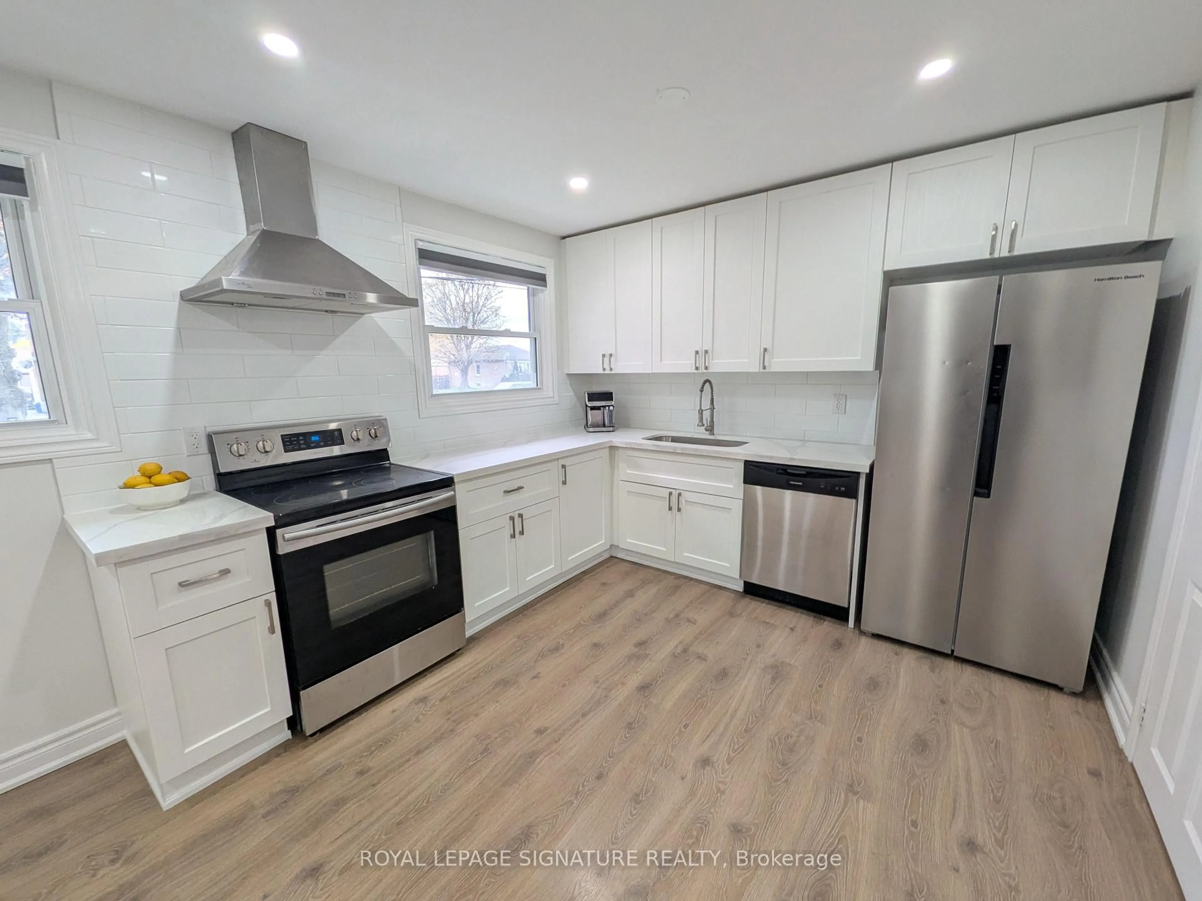 Open concept kitchen, wood/laminate floor for 520 Burnham St, Cobourg Ontario K9A 2W7