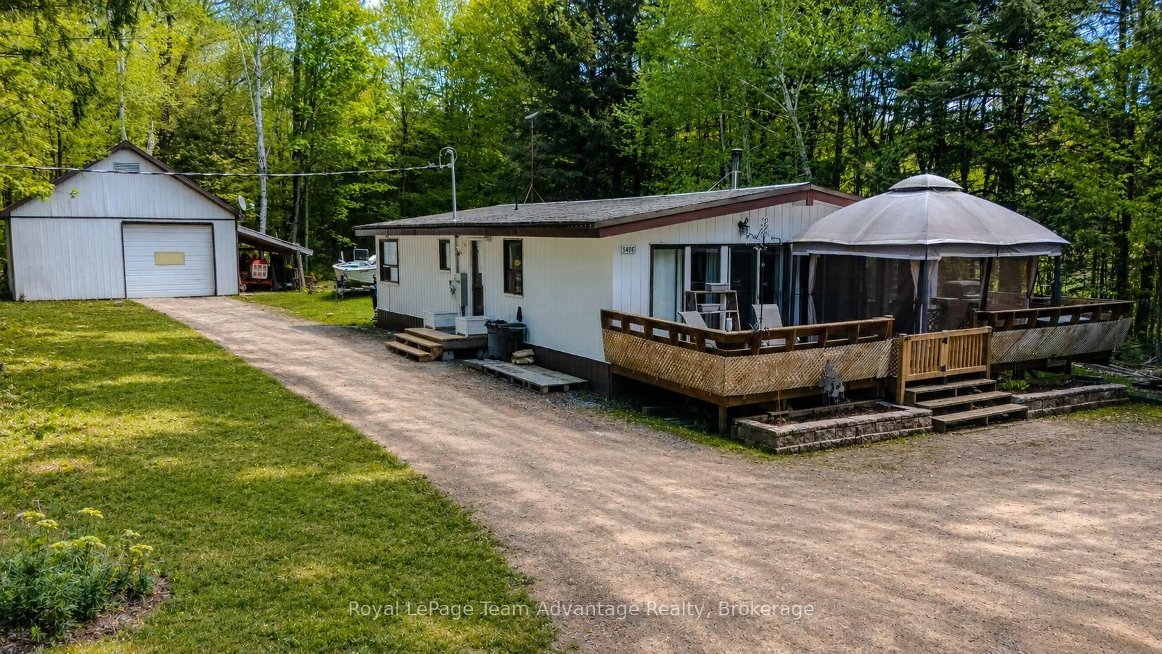 A pic from outside/outdoor area/front of a property/back of a property/a pic from drone, street for 548C East Bear Lake Rd, McMurrich/Monteith Ontario P0A 1Y0