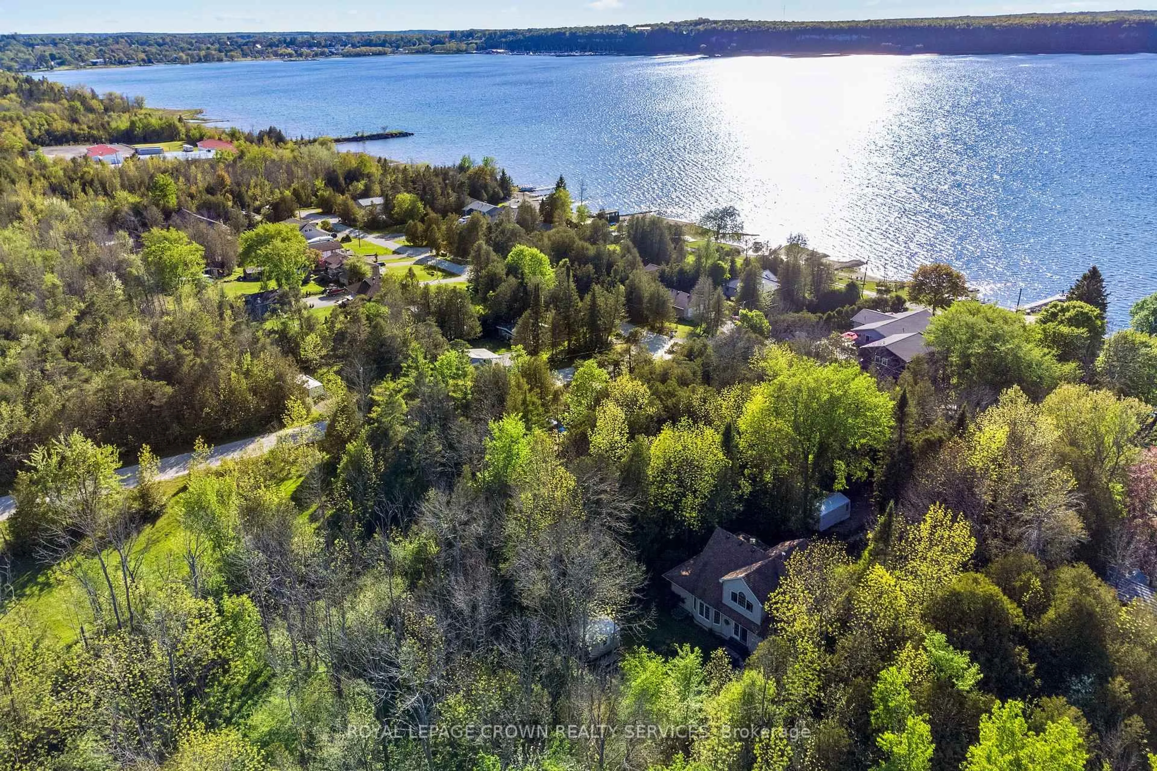 A pic from outside/outdoor area/front of a property/back of a property/a pic from drone, water/lake/river/ocean view for 126 Wilson Dr, Georgian Bluffs Ontario N0H 2T0