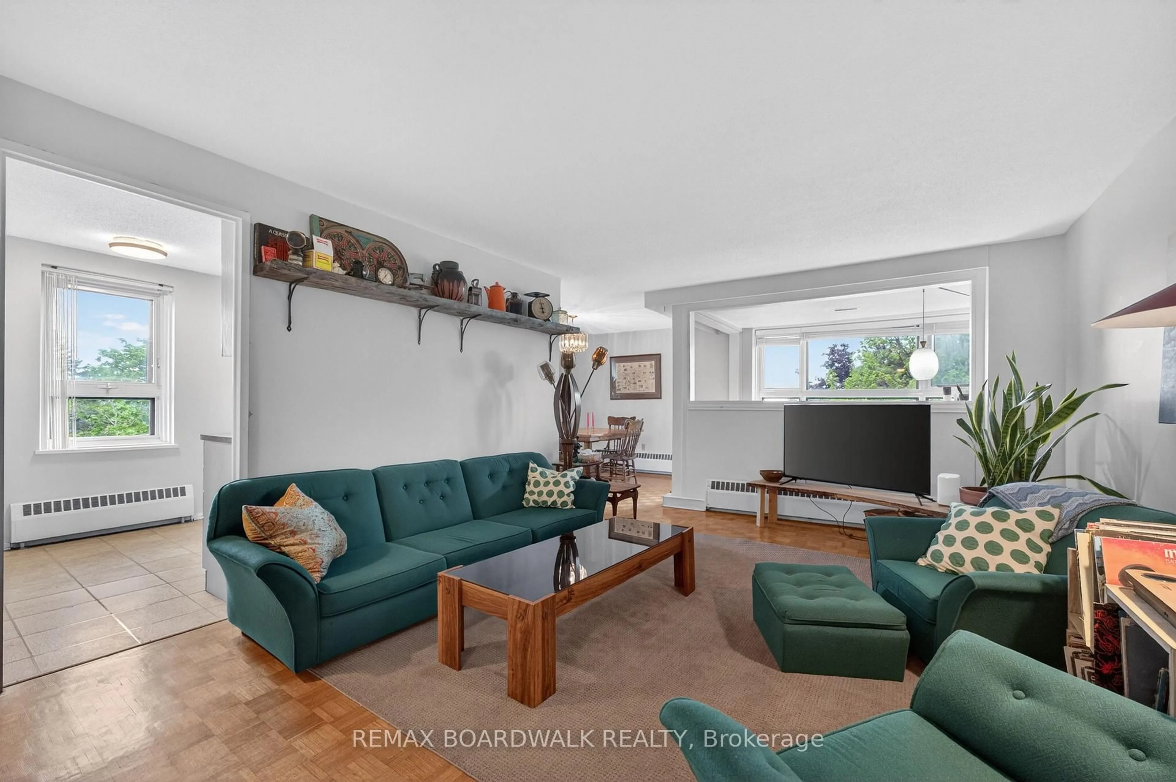 Living room with furniture, unknown for 1356 Meadowlands Dr #308, Ottawa Ontario K2E 6K6