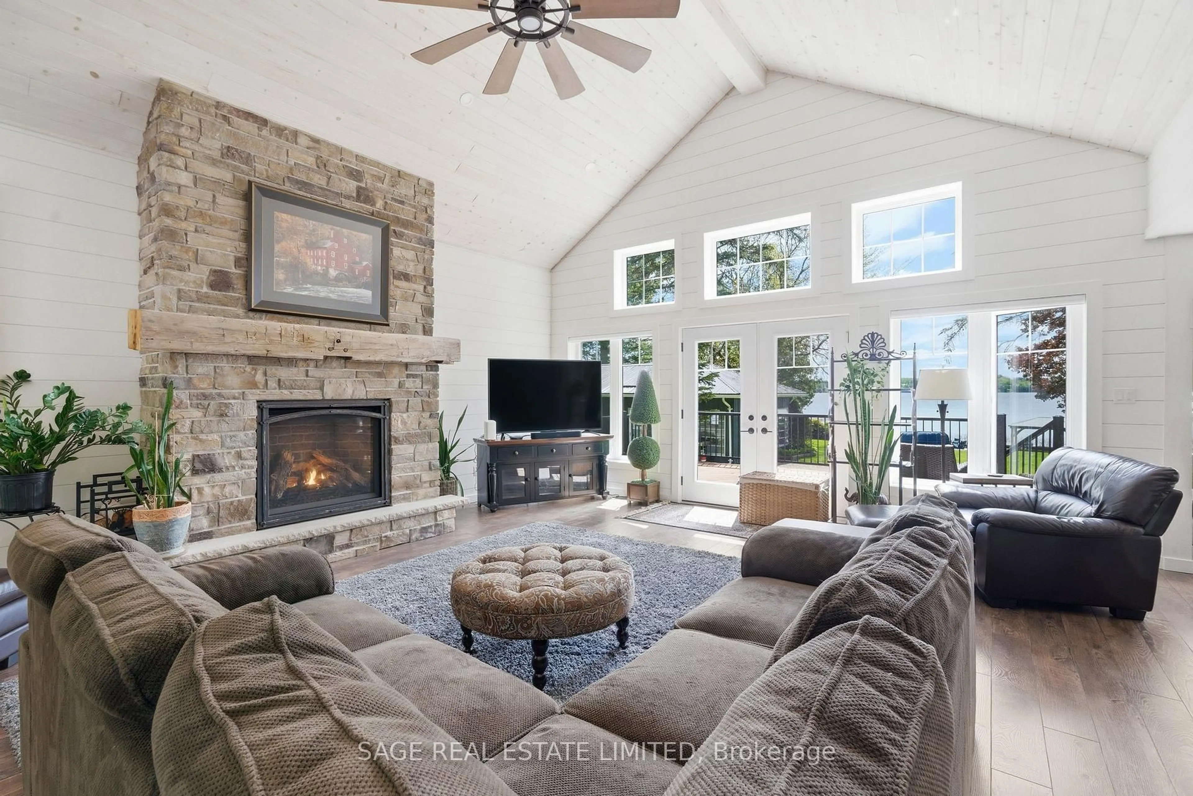 Living room with furniture, ceramic/tile floor for 141 Sandy Point Rd, Kawartha Lakes Ontario K0M 1N0