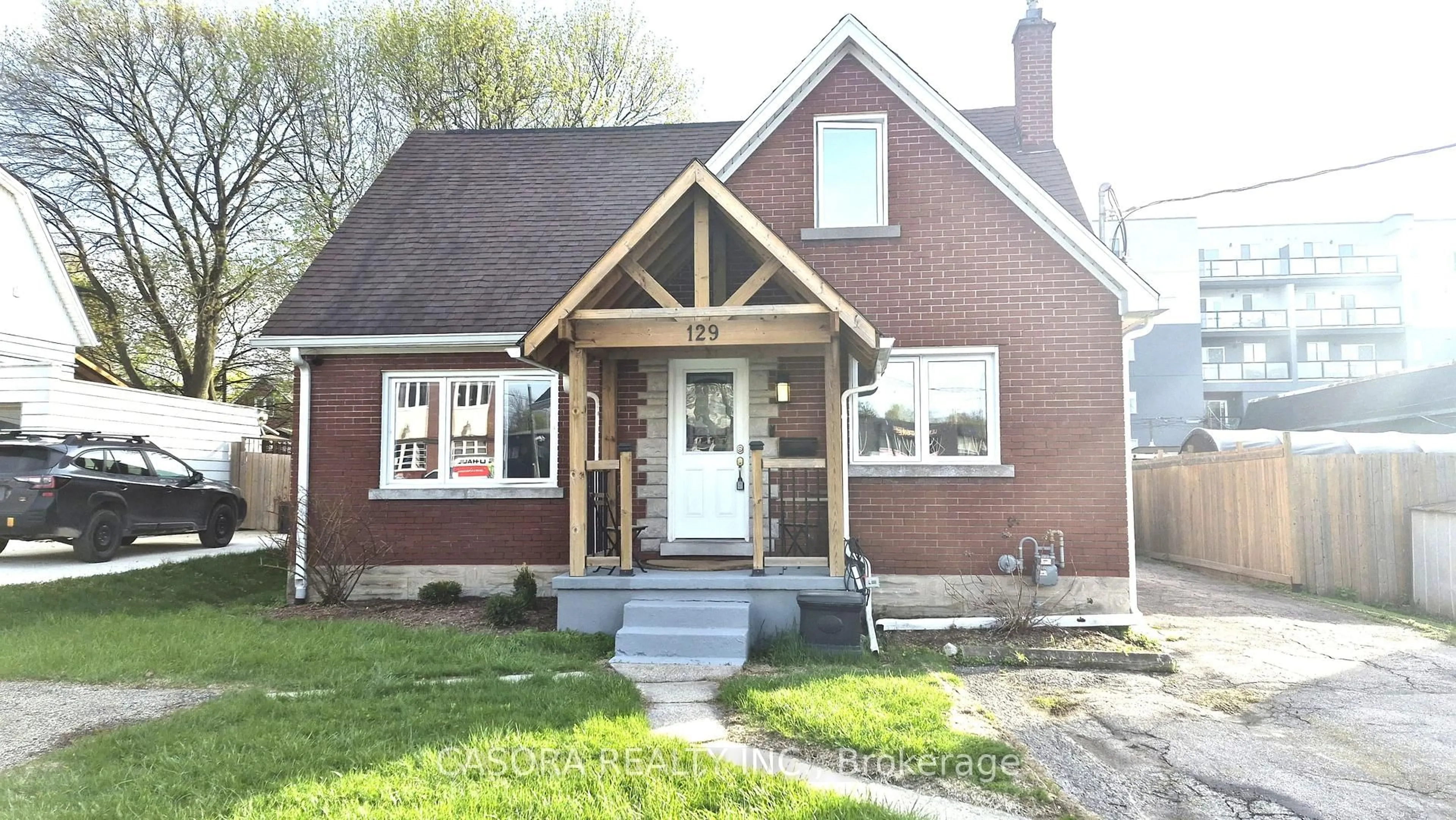 Home with brick exterior material, street for 129 Moore Ave, Waterloo Ontario N2J 1X4