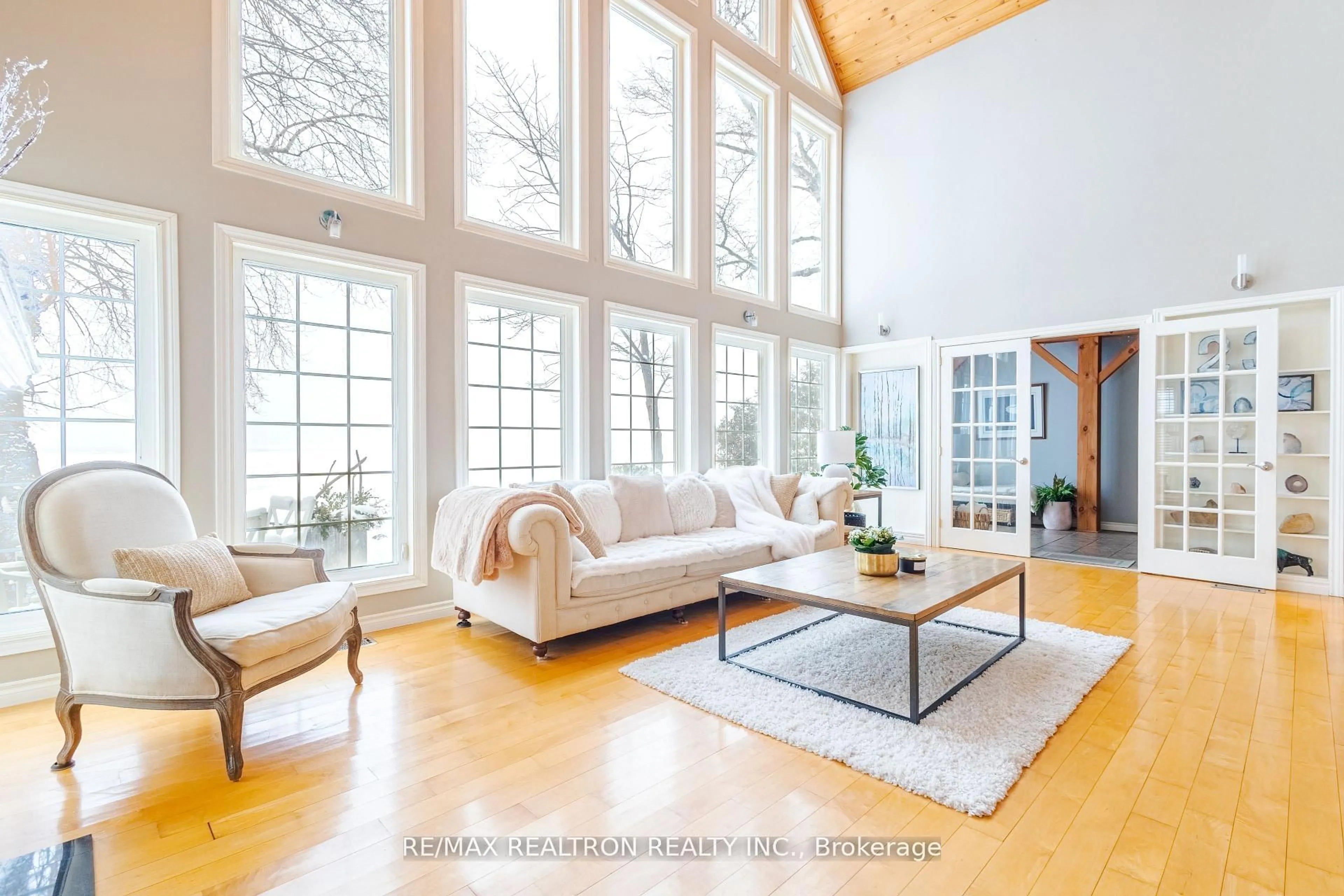 Living room with furniture, wood/laminate floor for 209733 Highway 26 Highway, Blue Mountains Ontario L9Y 0M8