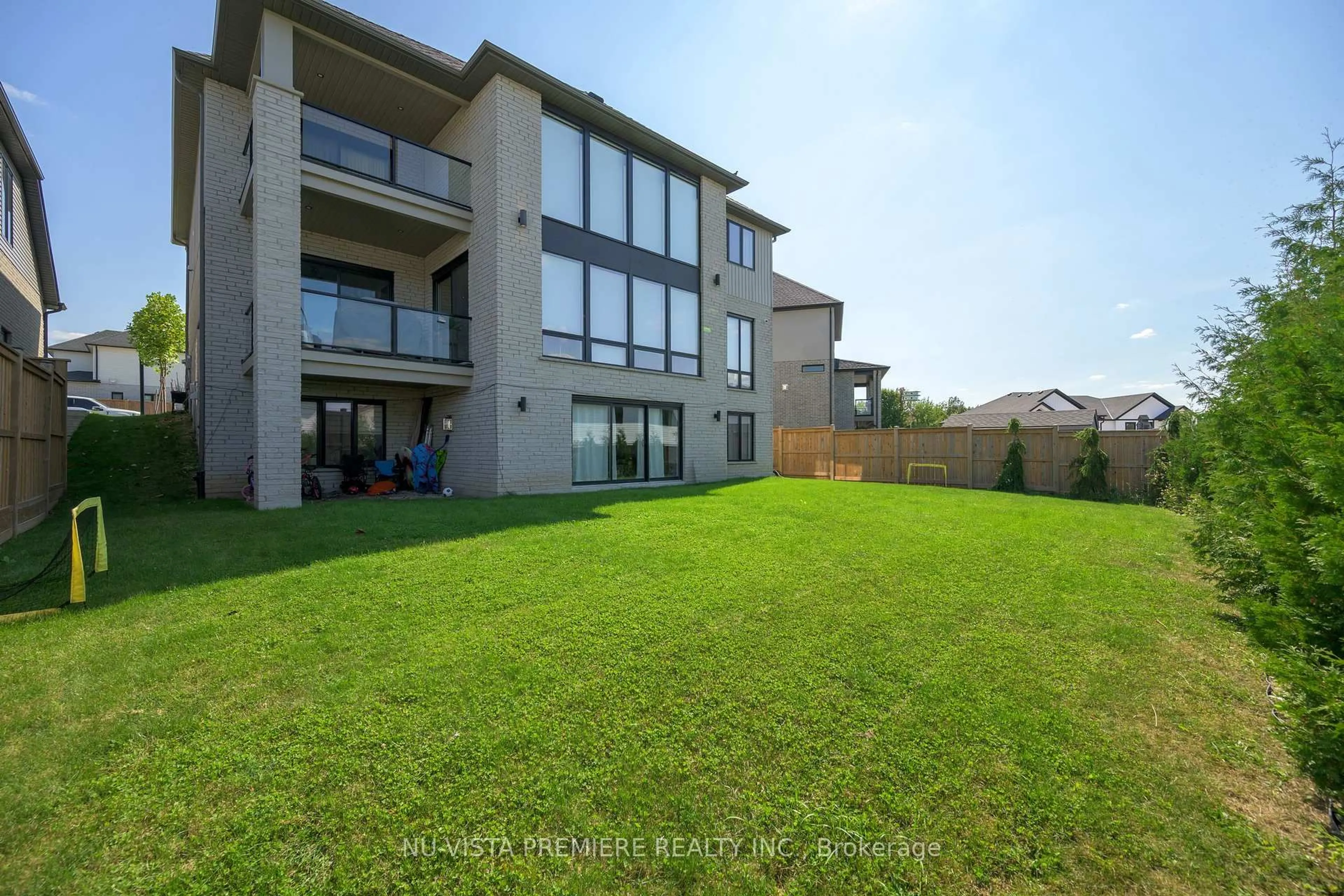 A pic from outside/outdoor area/front of a property/back of a property/a pic from drone, water/lake/river/ocean view for 7501 Silver Creek Cres, London South Ontario N6P 0A1