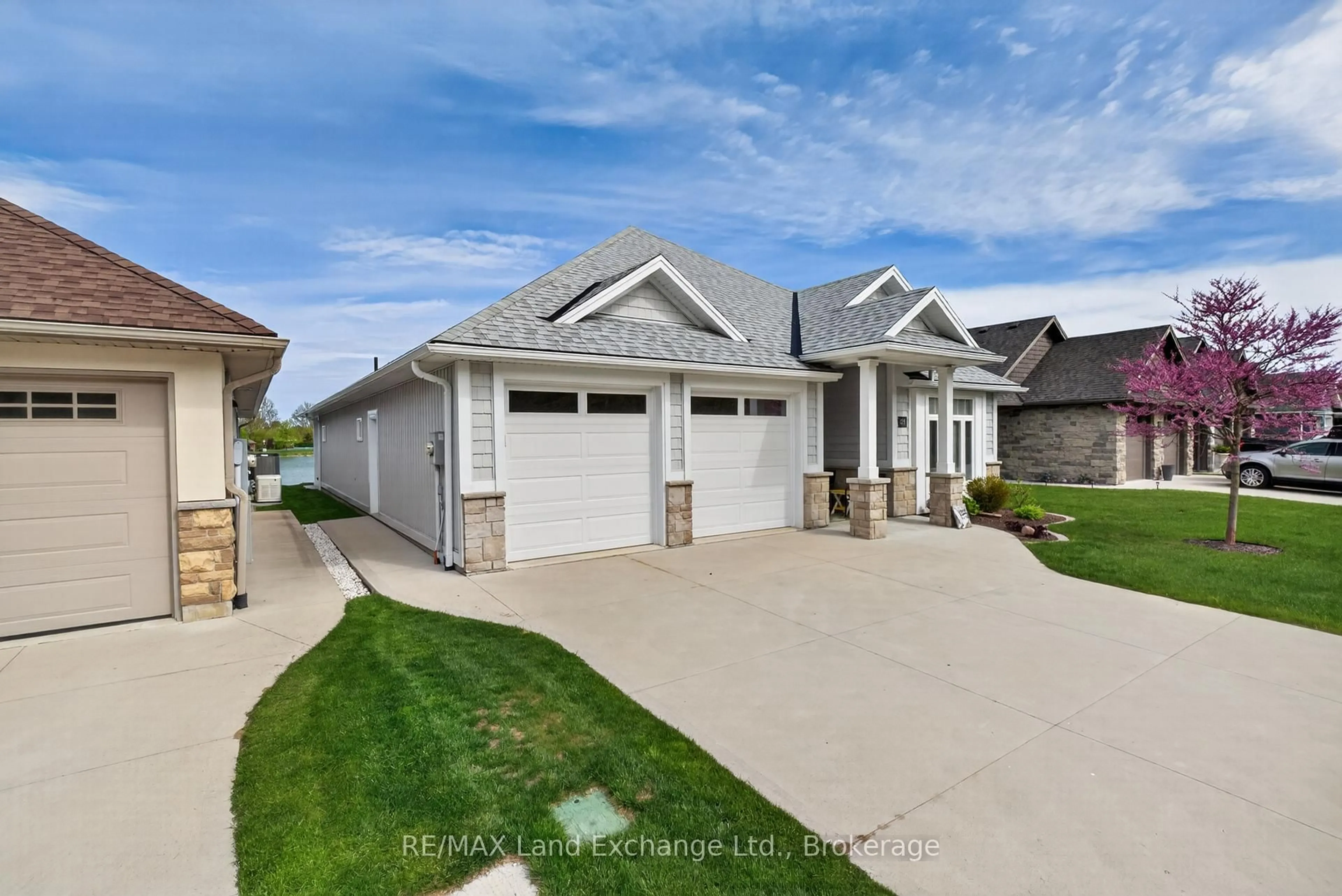 Home with vinyl exterior material, street for 221 Carloway Tr #15, Huron-Kinloss Ontario N2Z 0A4