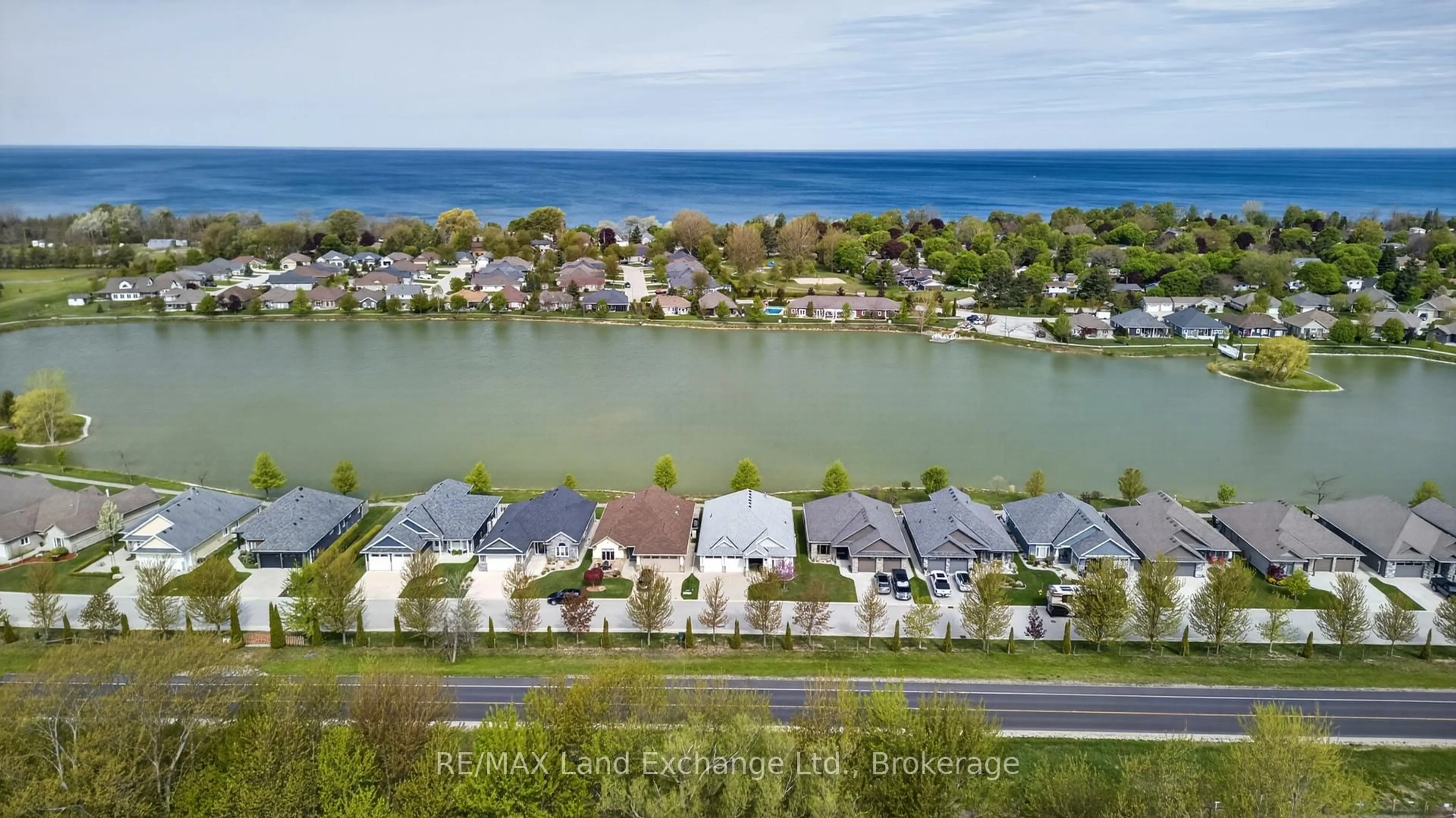 A pic from outside/outdoor area/front of a property/back of a property/a pic from drone, water/lake/river/ocean view for 221 Carloway Tr #15, Huron-Kinloss Ontario N2Z 0A4