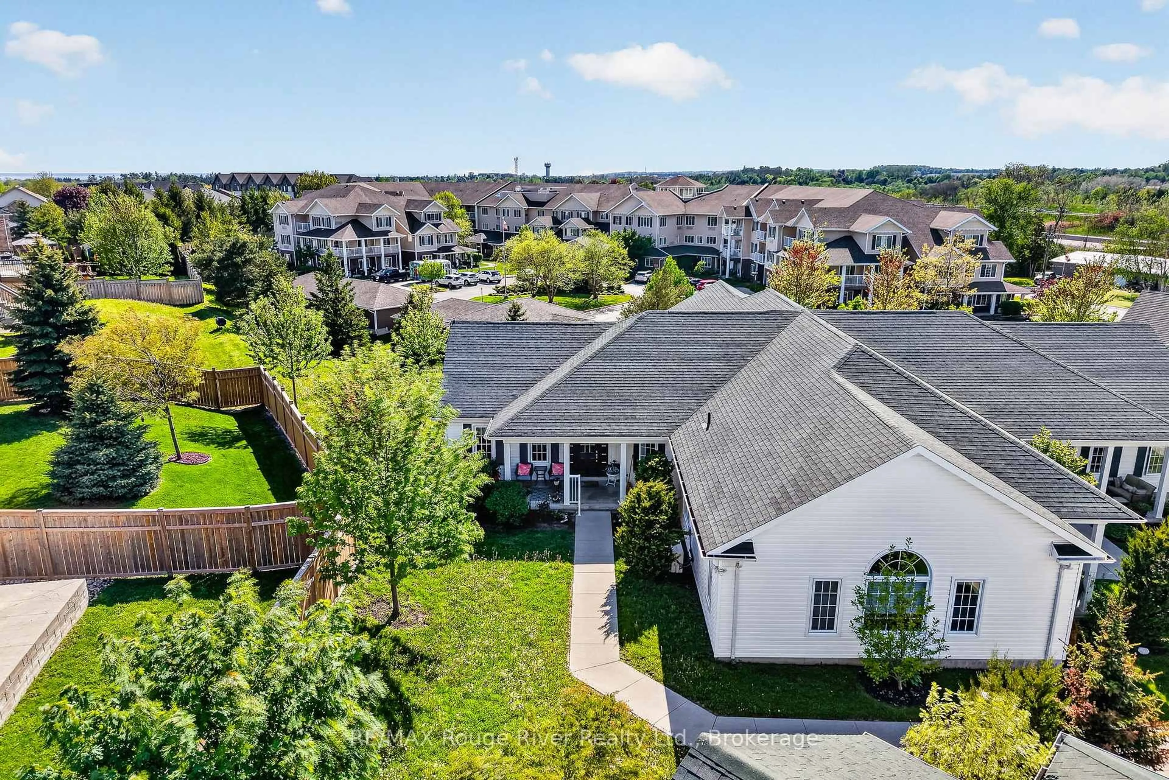 A pic from outside/outdoor area/front of a property/back of a property/a pic from drone, unknown for 295 DENSMORE Rd #403, Cobourg Ontario K9A 4J9