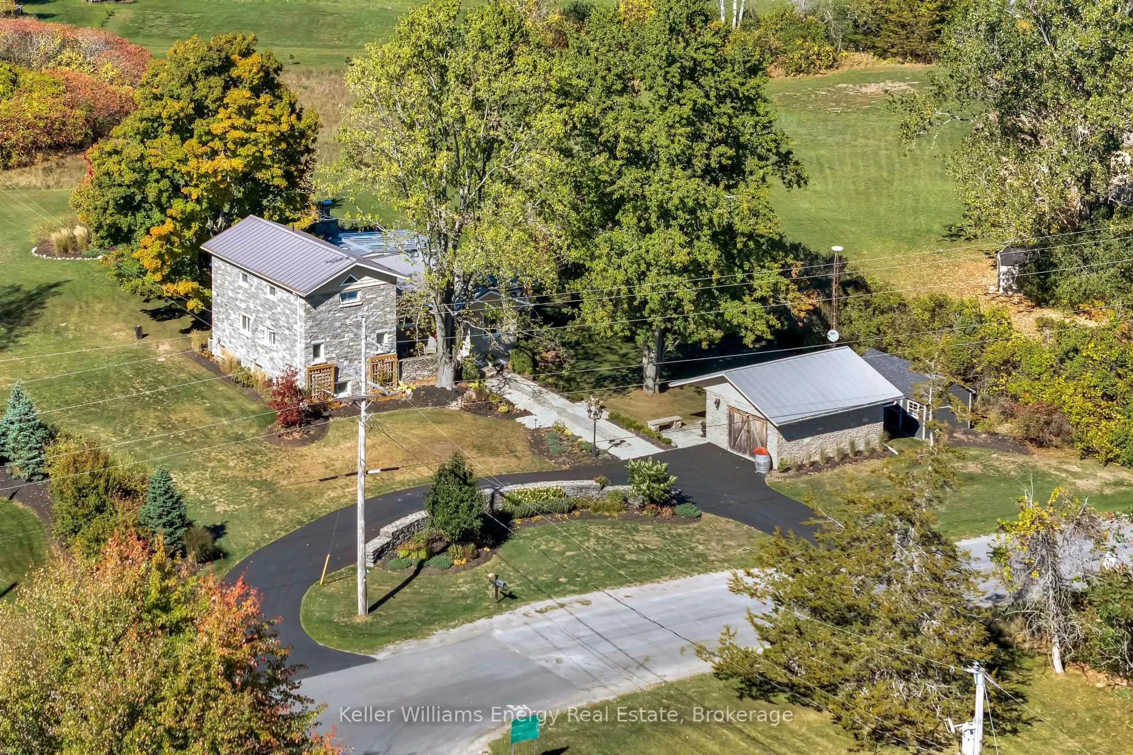 A pic from outside/outdoor area/front of a property/back of a property/a pic from drone, mountain view for 1245 Miller Rd, Prince Edward County Ontario K0K 2T0