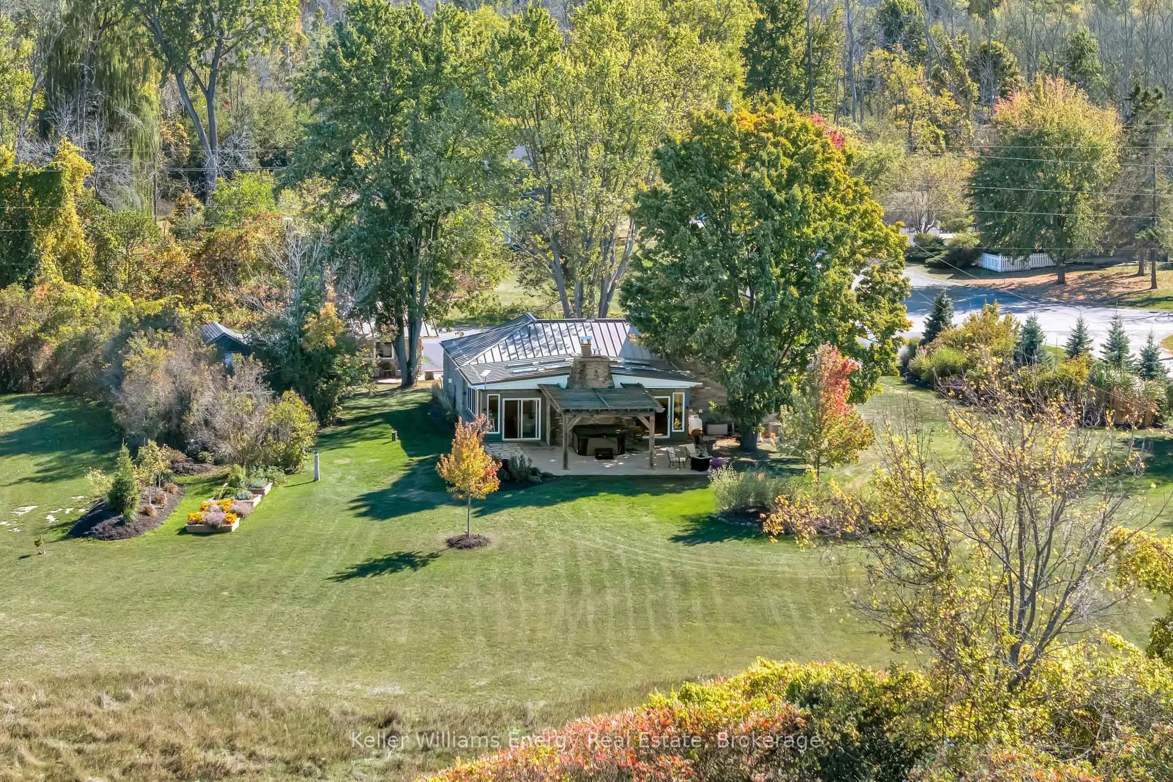 A pic from outside/outdoor area/front of a property/back of a property/a pic from drone, water/lake/river/ocean view for 1245 Miller Rd, Prince Edward County Ontario K0K 2T0